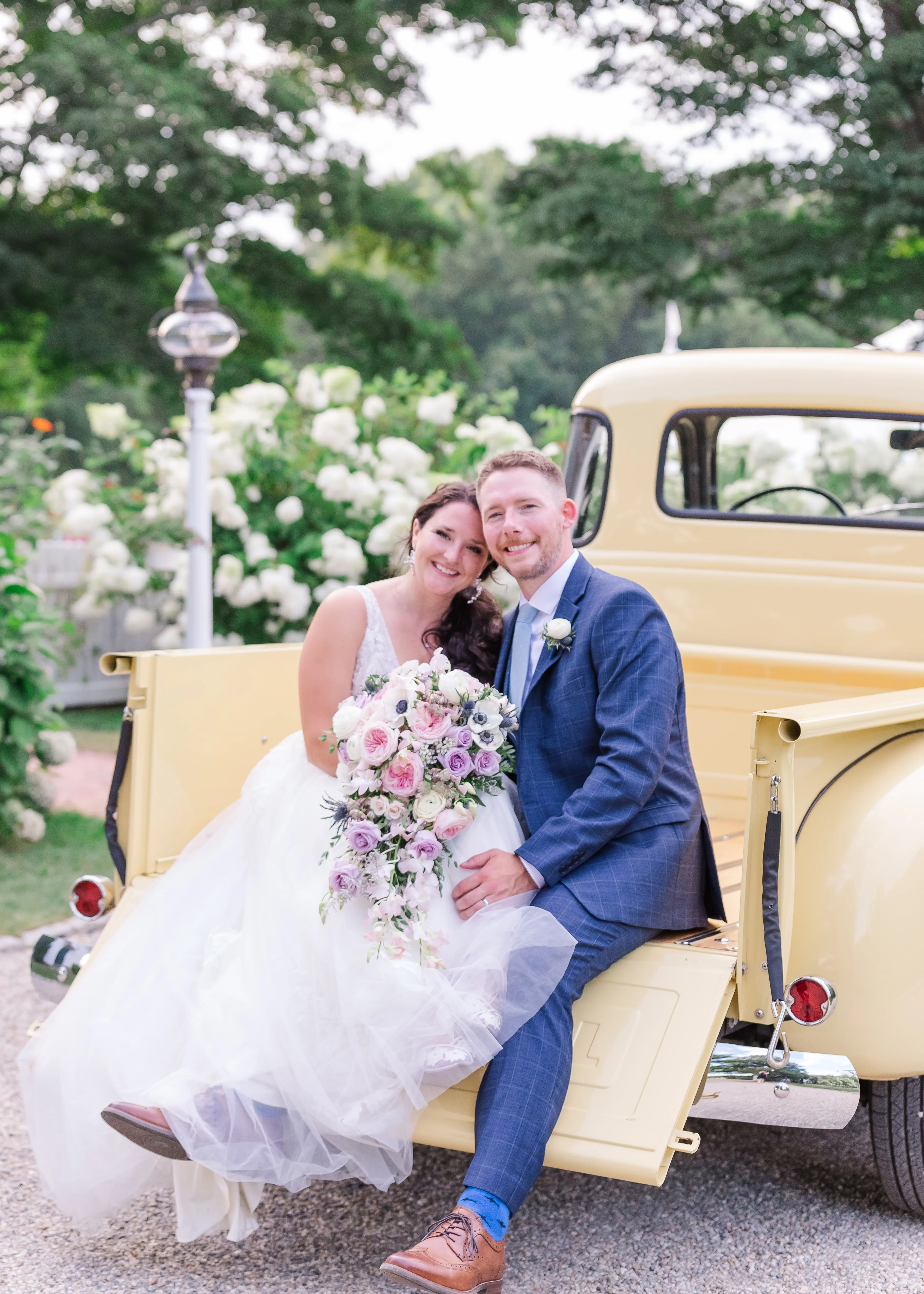 Groom With Bride Wearing Lace A-Line Wedding Dress Raelynn By Rebecca Ingram