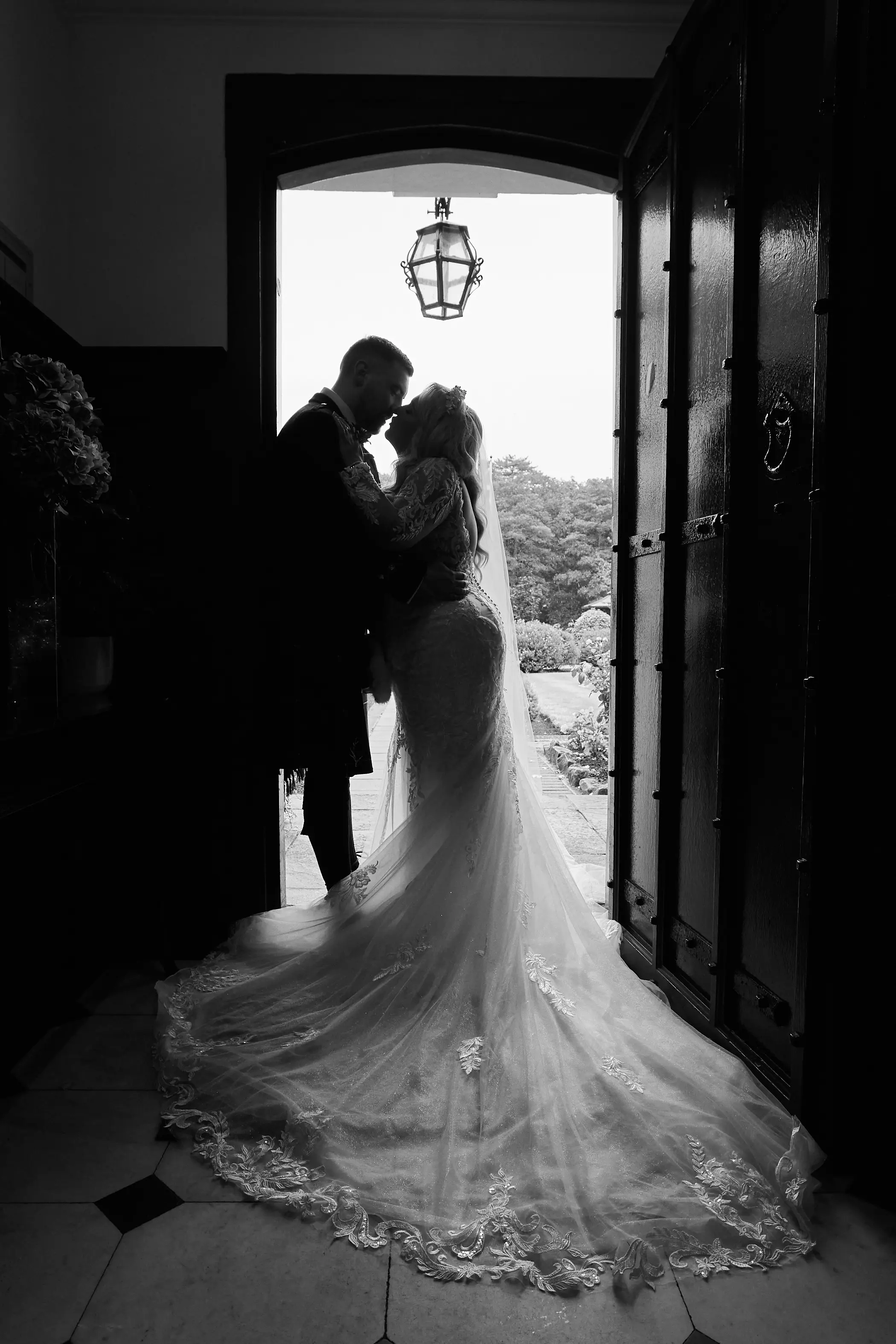 Bride wearing Saige by Maggie Sottero kissing her husband