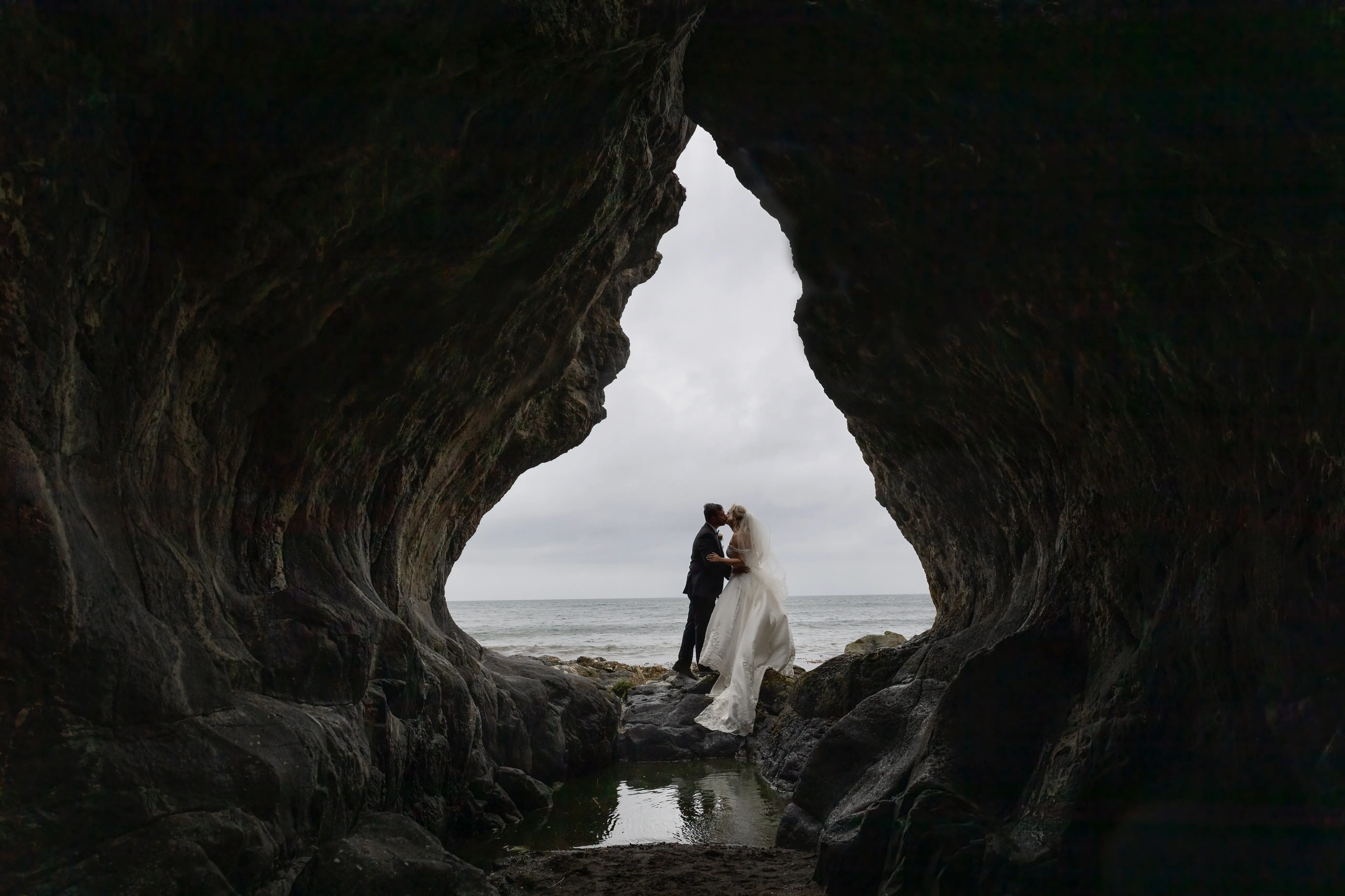 Bride In Satin Wedding Dress Called Kimora By Sottero And Midgley With Groom