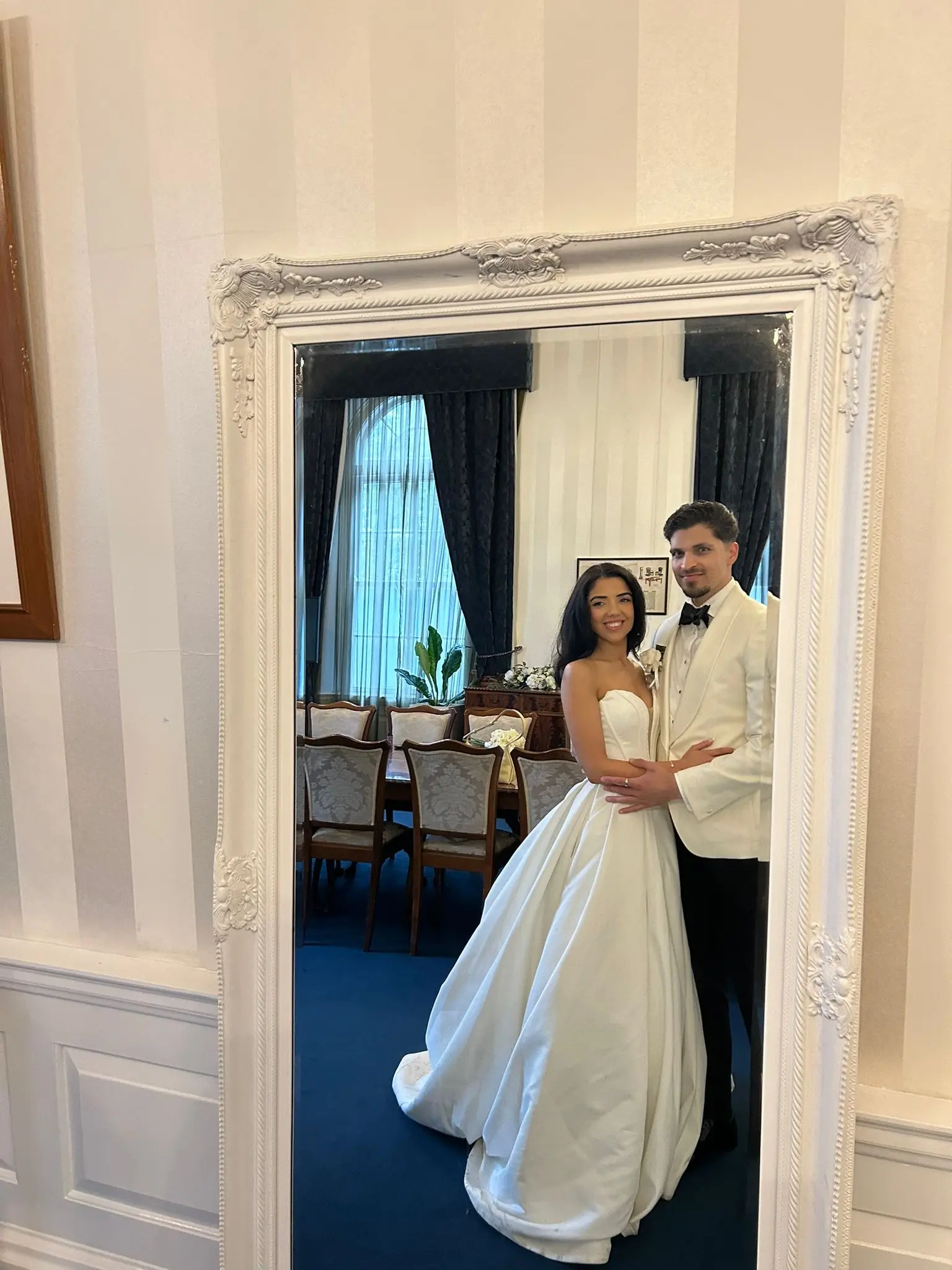 Bride wearing Derrick by Maggie Sottero with her husband
