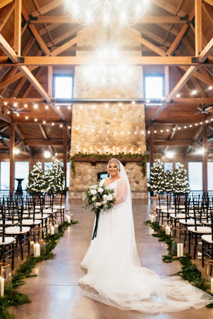 Bride wearing Joanne wedding dress by Rebecca Ingram