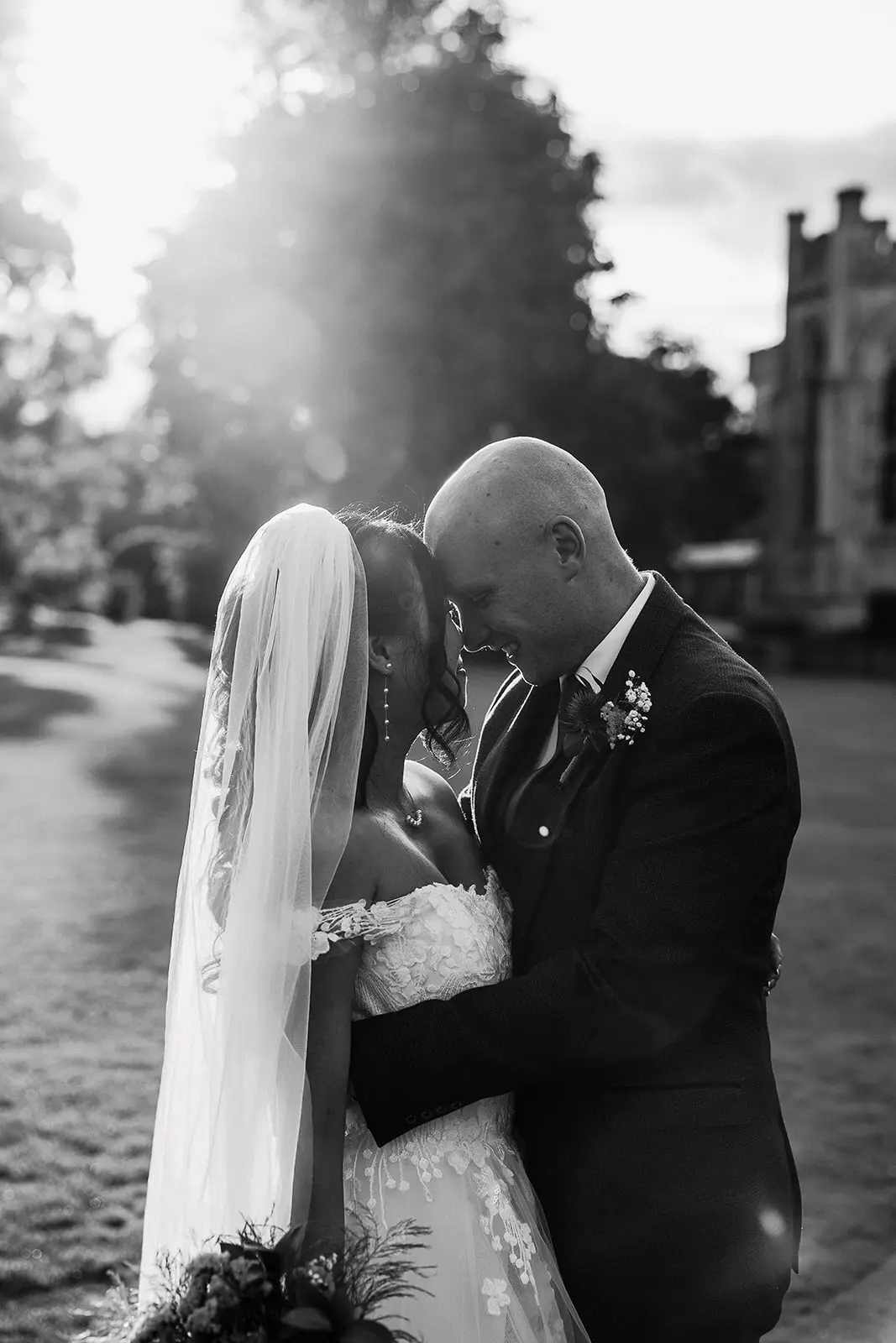 Bride wearing Harlem by Maggie Sottero with her husband