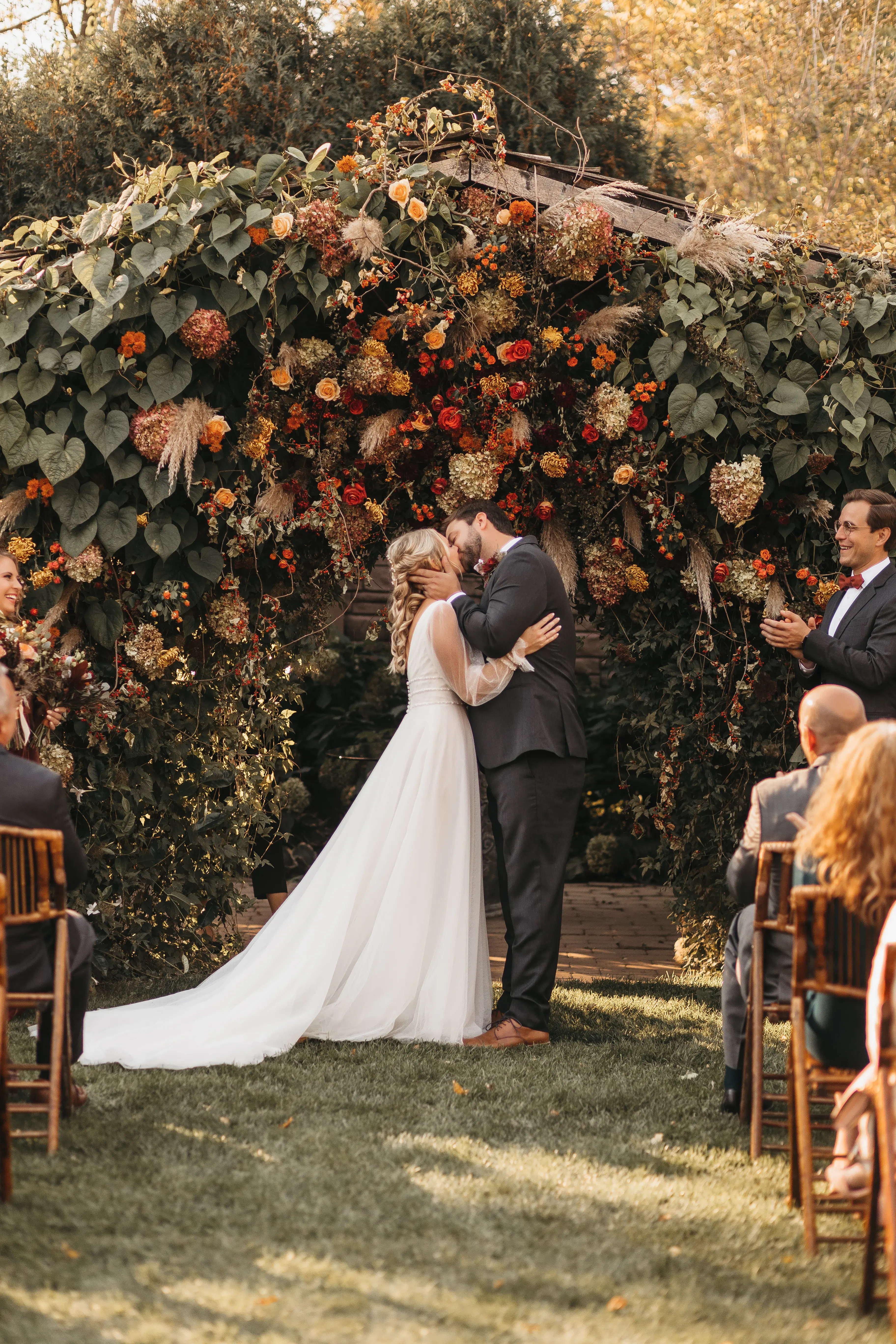 Bride with groom in long bishop sleeve, boho wedding dress