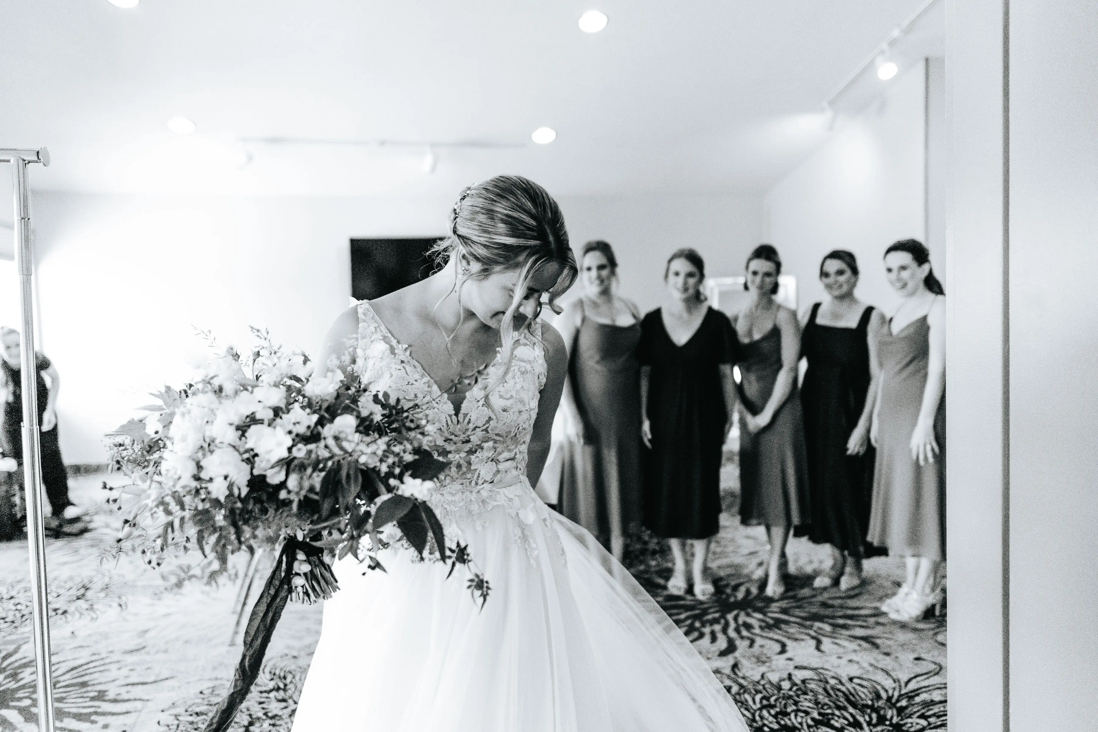 Bride Wearing V-Neck A-Line Wedding Dress Minerva By Rebecca Ingram