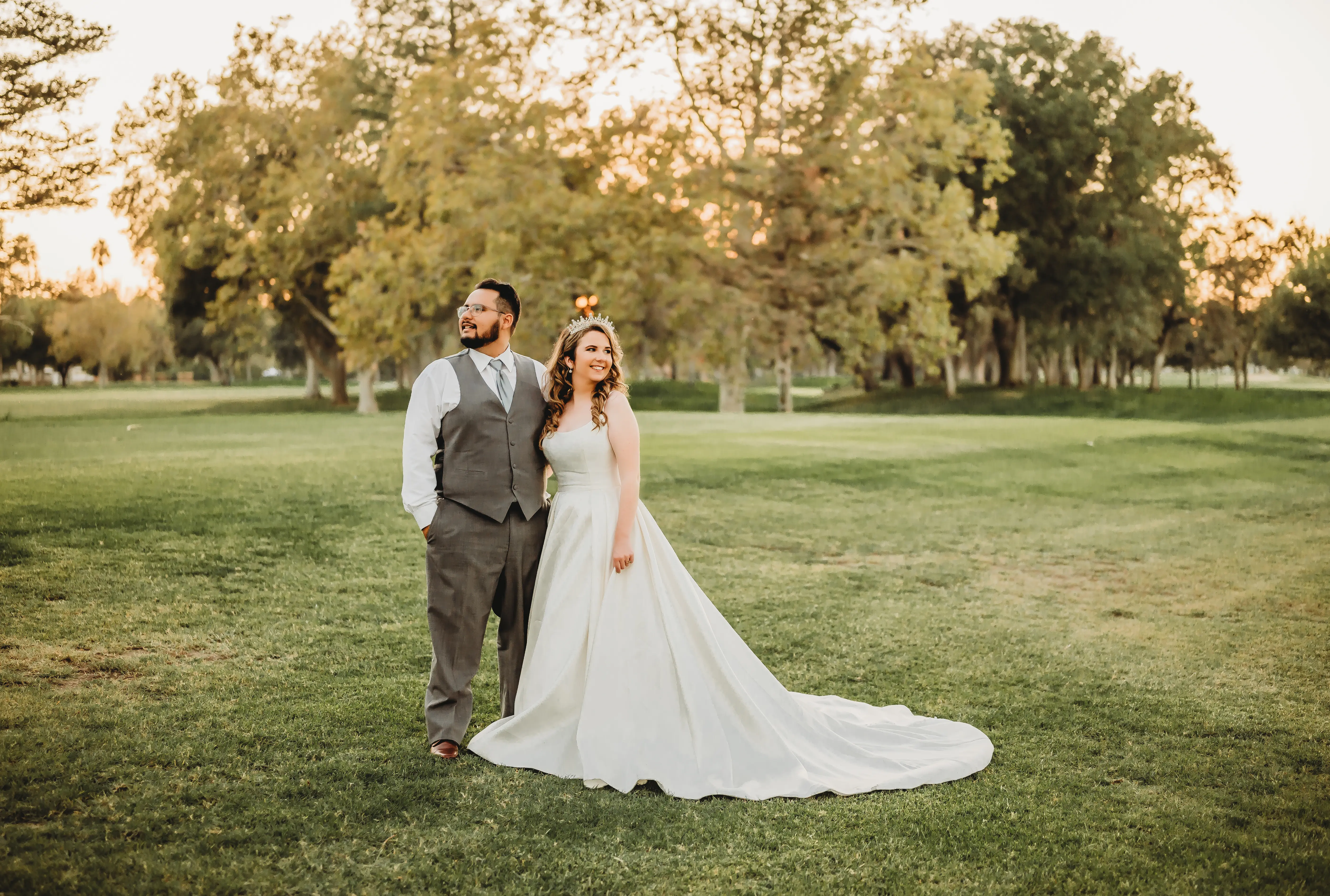 Bride And Groom Standing Together. Bride In Satin A-Line Wedding Dress Called Selena By Maggie Sottero