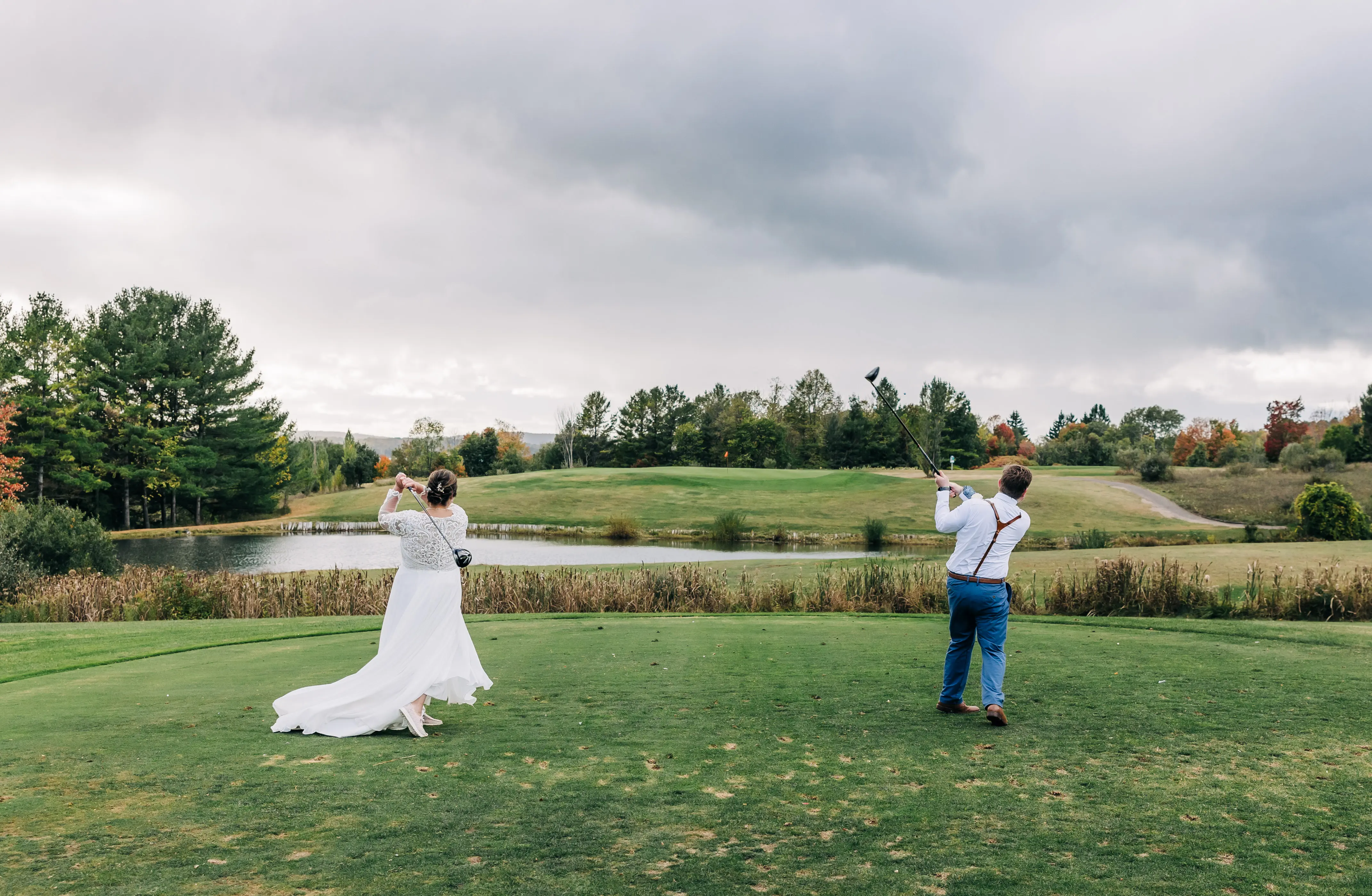 Groom and Bride Wearing Boho Wedding Dress Called Lorraine Dawn By Rebecca Ingram Playing Golf