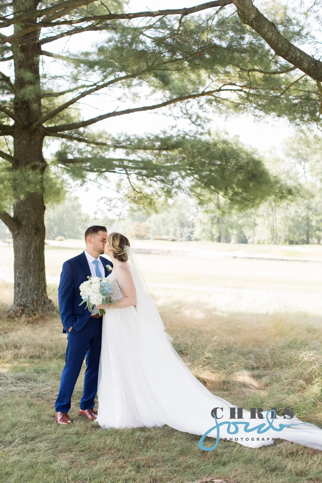 Real Bride wearing a-line wedding dress called Charlene by Maggie Sottero.
