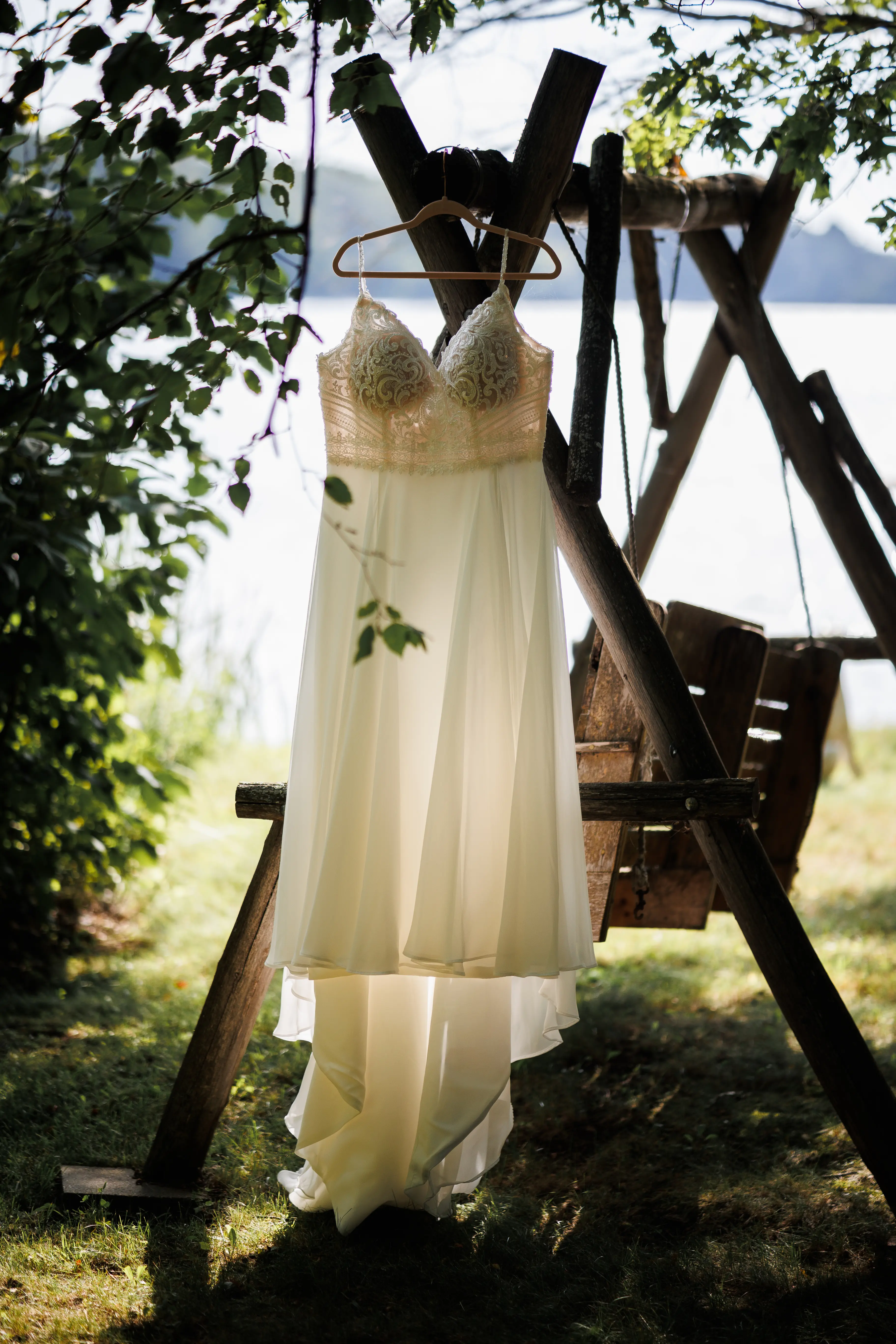 Beaded Wedding Dress With Flowy Skirt Called Lorraine By Rebecca Ingram On A Hanger
