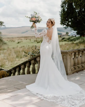 Bride Wearing Lace Mermaid Wedding Dress Called Nikki By Maggie Sottero About To Throw Her Bouquet