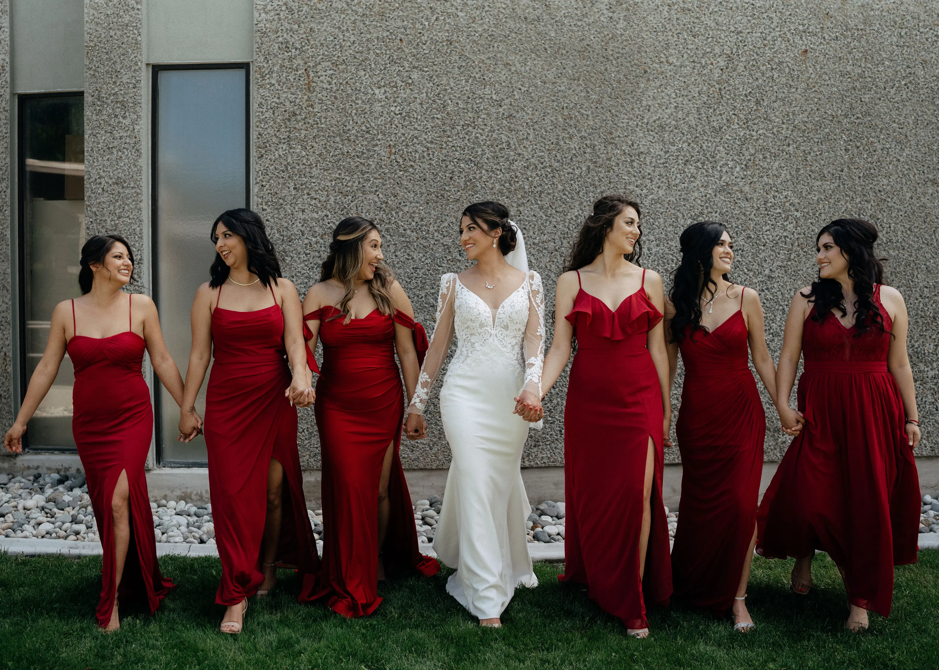Bridal Party with Bride in Lace Spaghetti Strap Mermaid Wedding Gown with Detachable Long Sleeves Called Nikki by Maggie Sottero