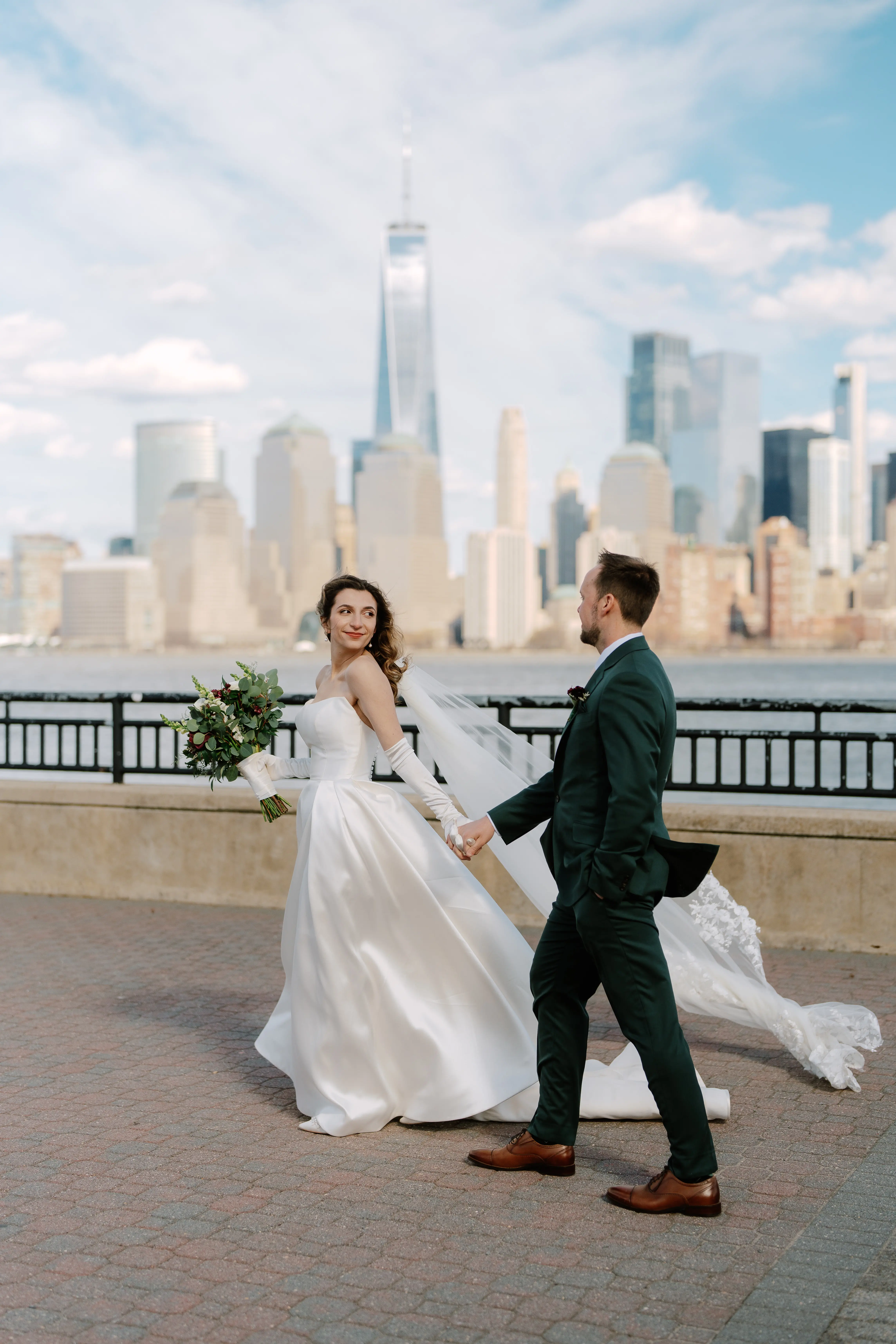 Bride wearing Selena by Maggie Sottero walking with her husband
