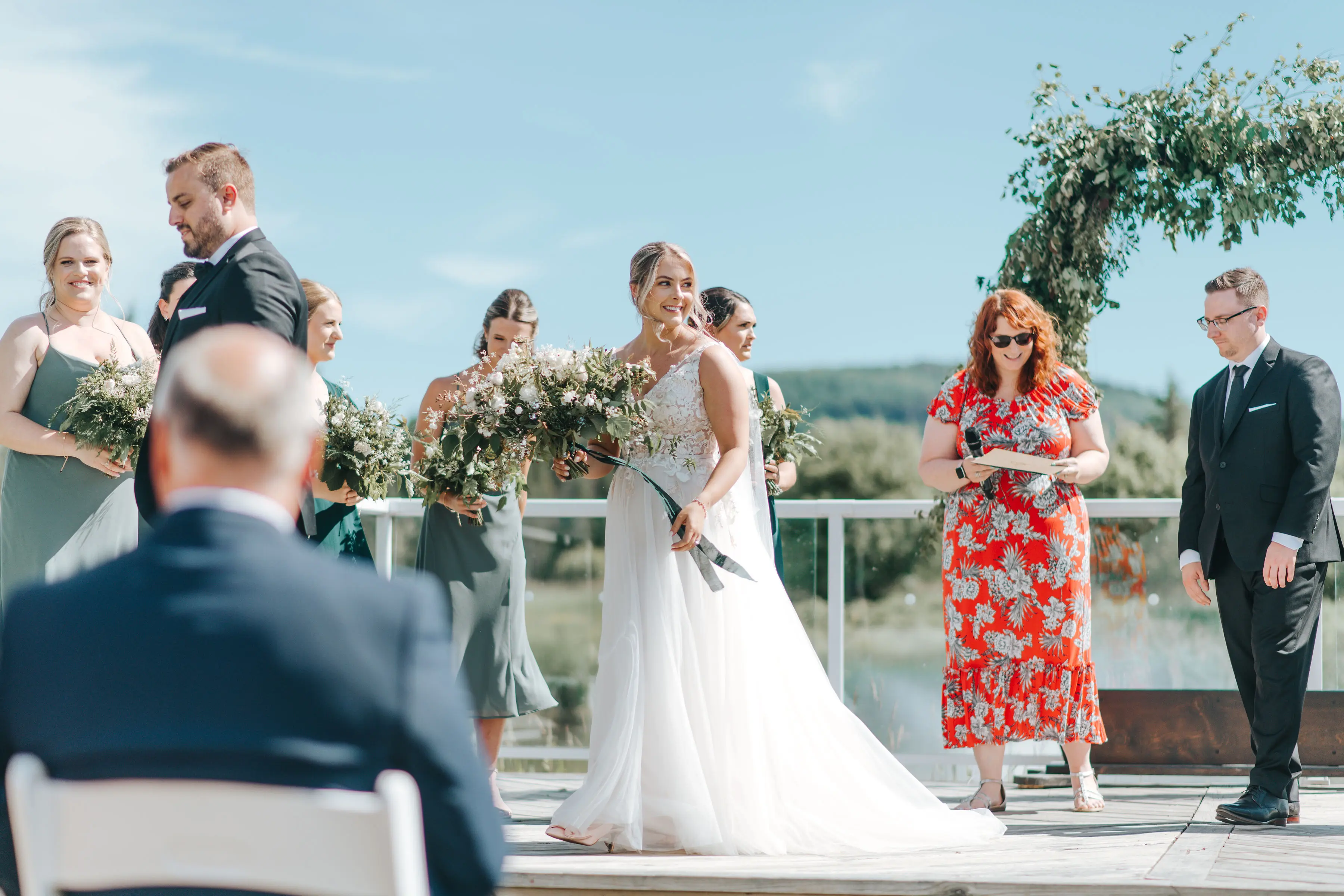 Bride Wearing V-Neck A-Line Wedding Dress Minerva By Rebecca Ingram