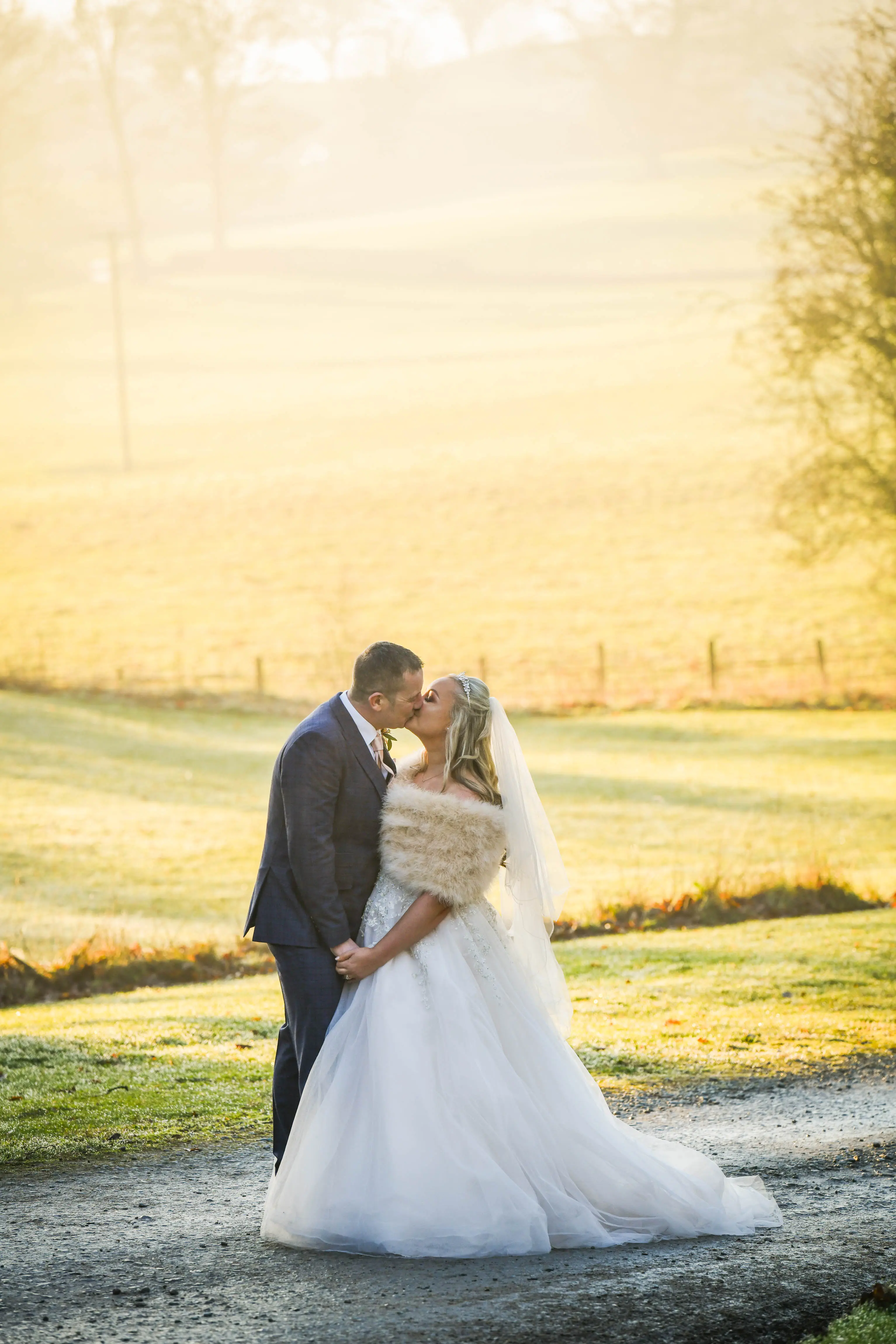 Groom With Bride Wearing Tulle Ballgown Talia By Maggie Sottero