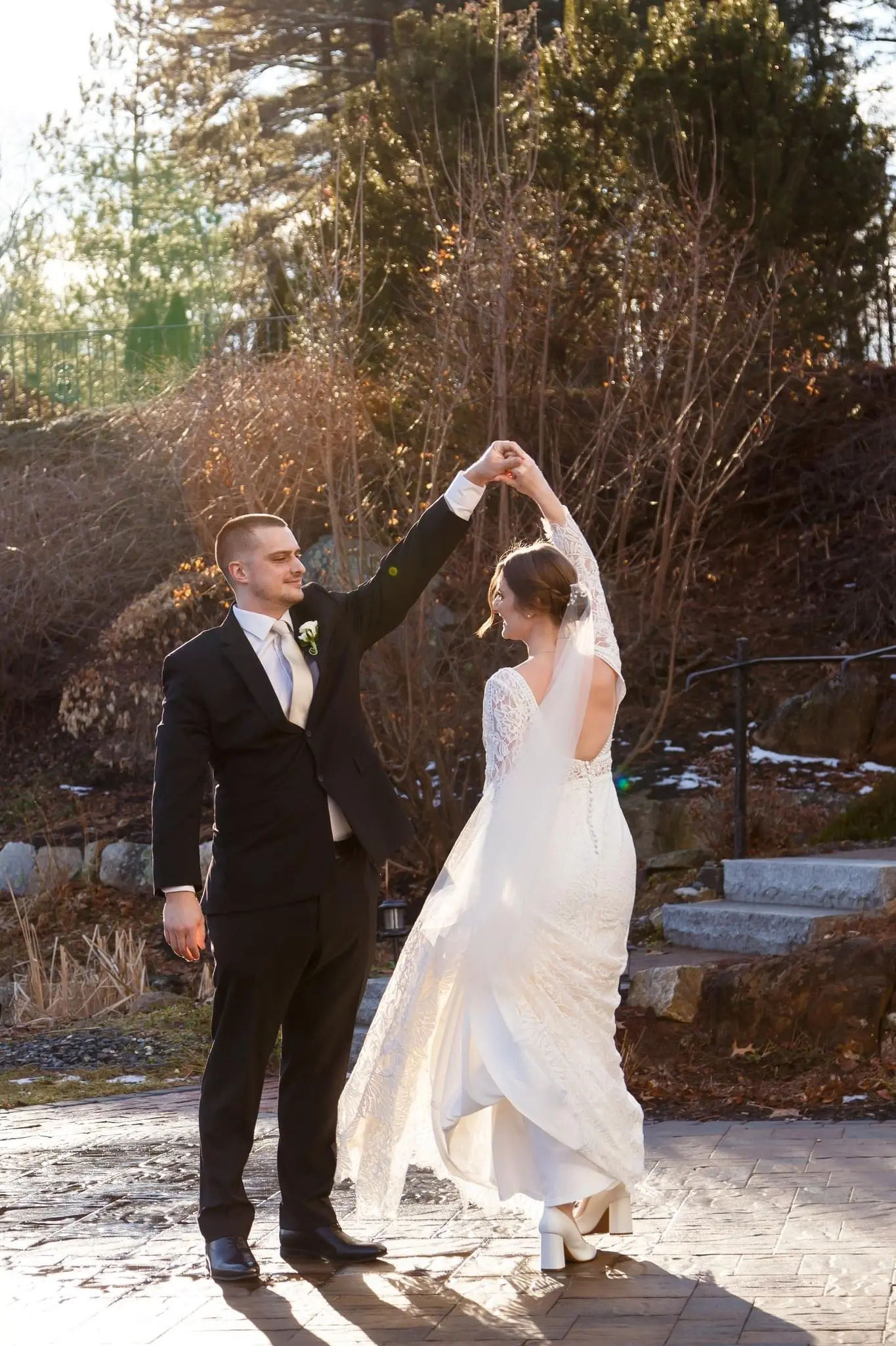 Bride Wearing Boho Sleeved Wedding Dress Called Drita By Maggie Sottero Dancing With Groom