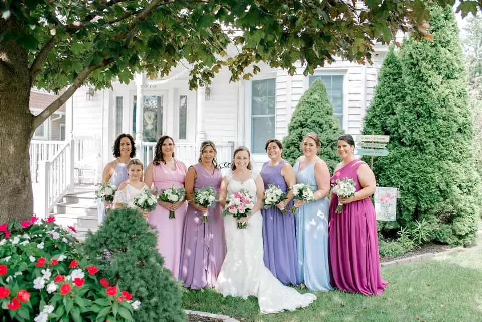 Bridesmaids with the Bride Wearing a Classic Lace Wedding Dress Called Brenda by Rebecca Ingram