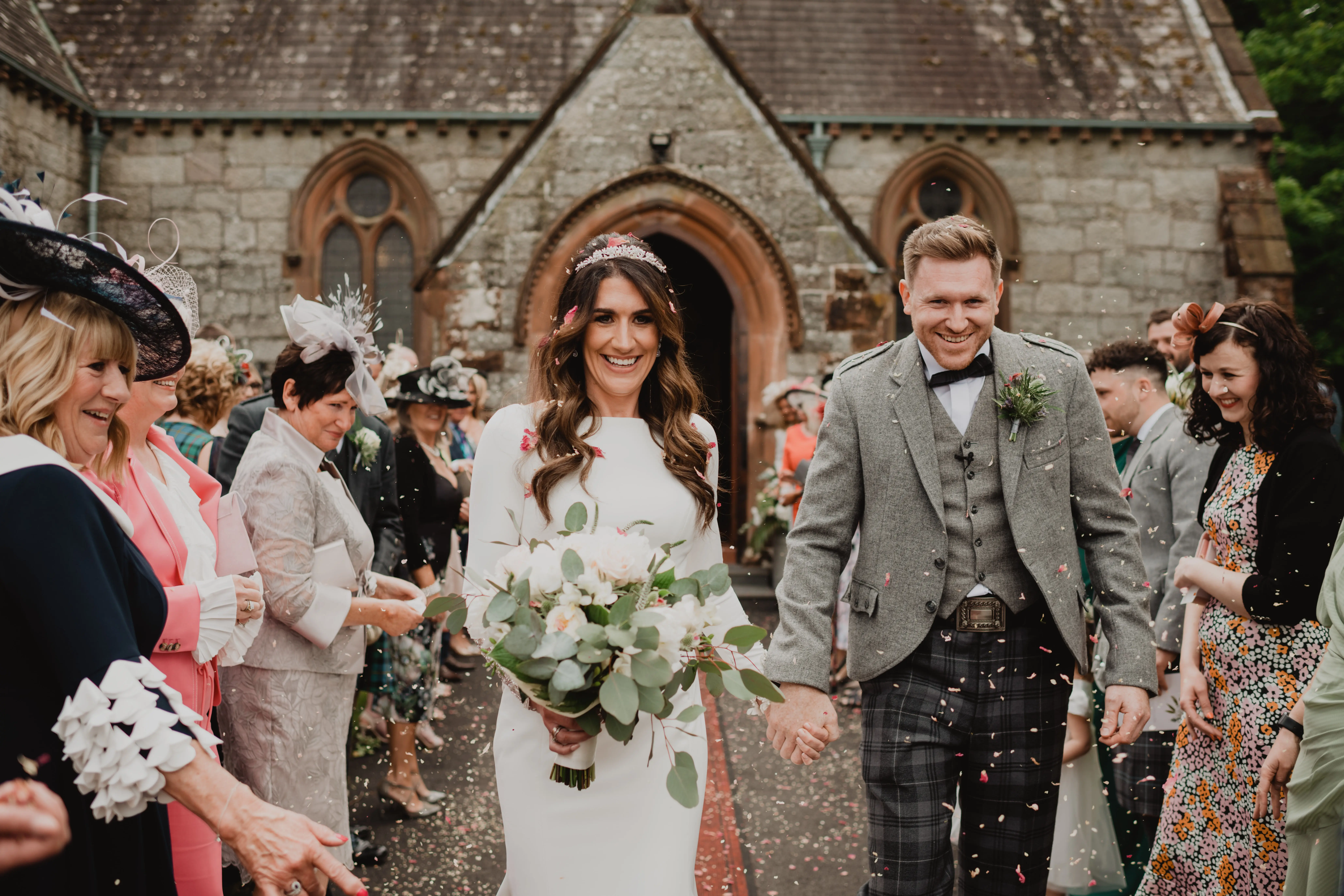 Real Bride in Crepe Fit-and-Flare Wedding Dress with a Statement Back of Beaded Illusion Embroidery Featuring Swarovski Crystals Called Aston by Sottero & Midgely