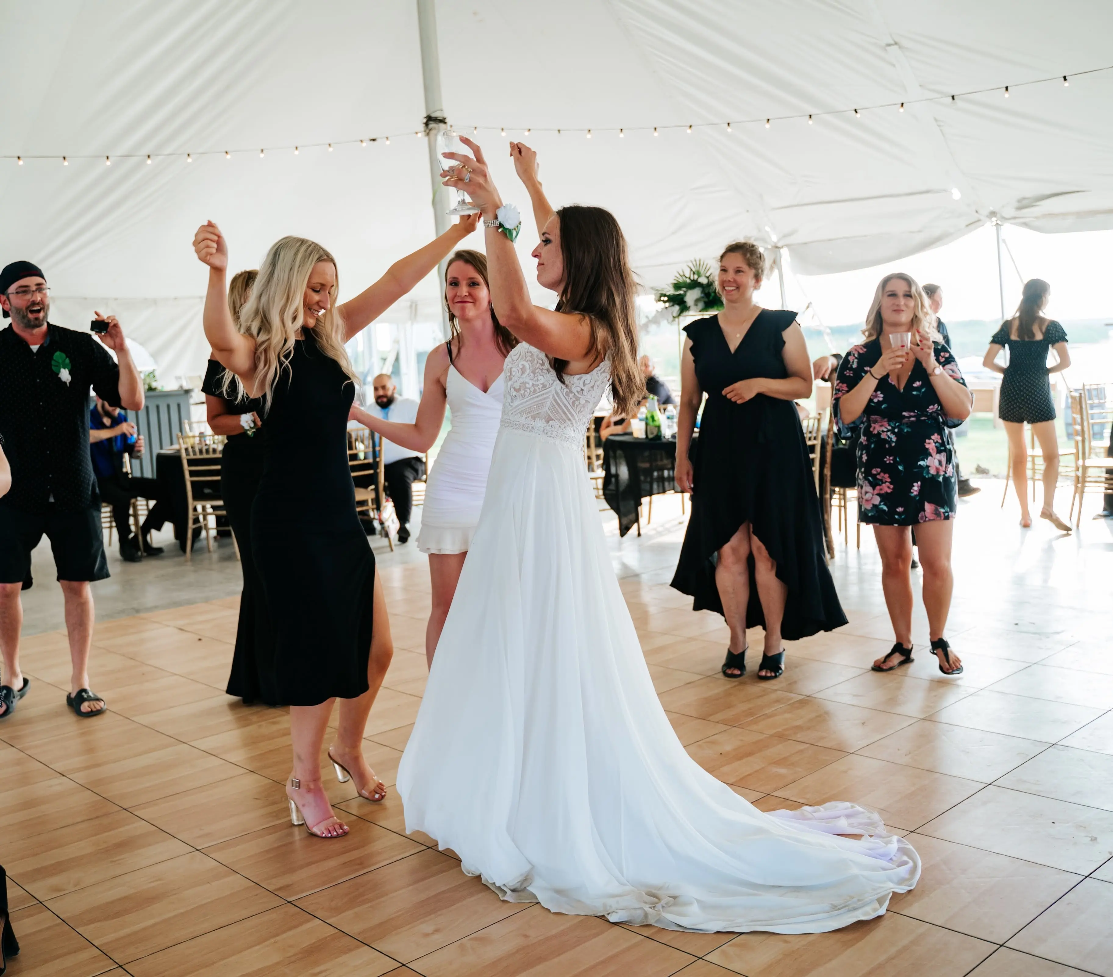 Bride Wearing Beach Sheath Wedding Dress Called Lorraine By Rebecca Ingram Dancing At Reception