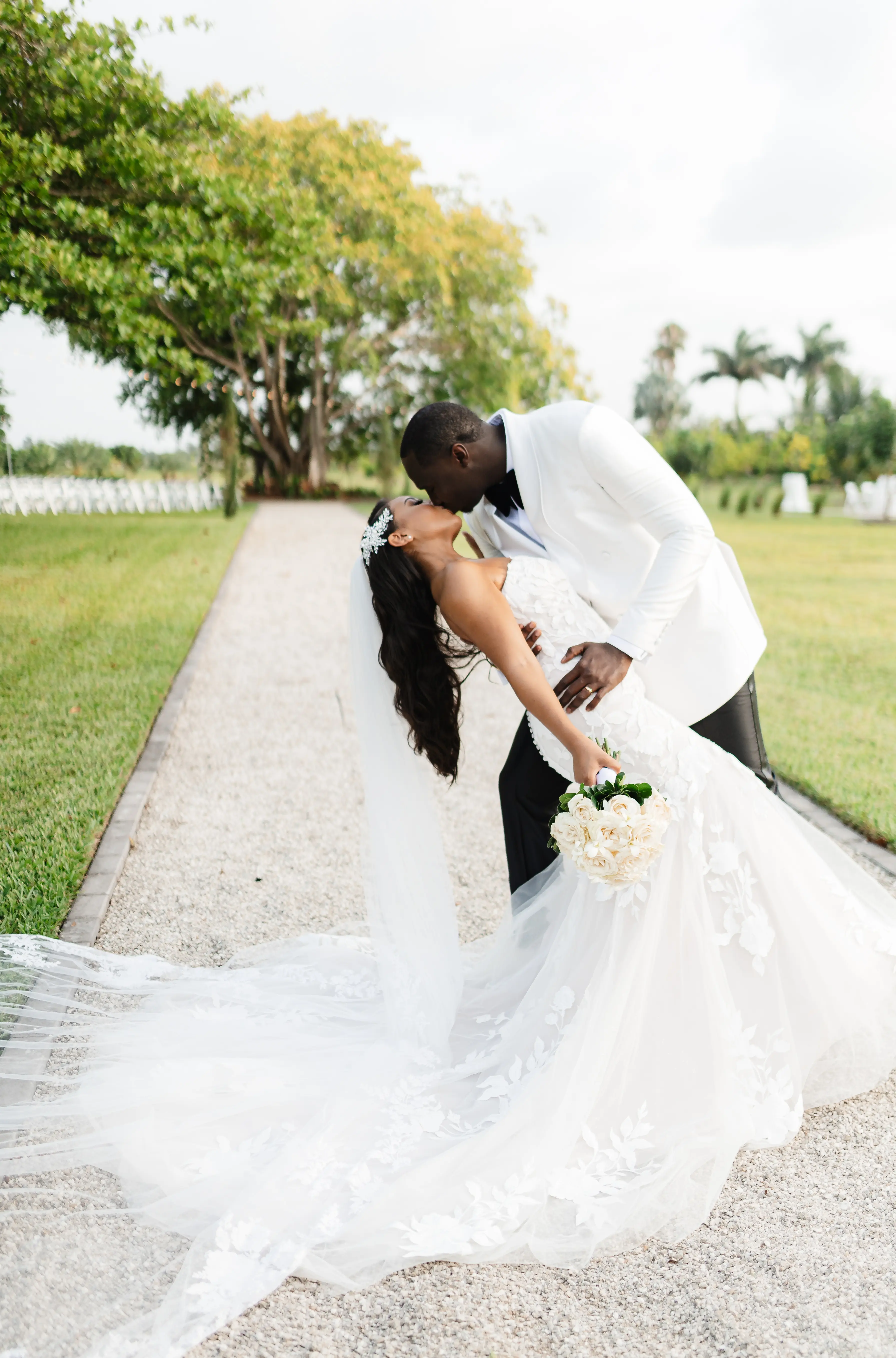 Real Bride in Strapless Mermaid Bridal Gown in Oversized Lace with Floral Lace Motifs over Sparkle Tulle and Sweetheart Neckline called Hattie by Rebecca Ingram
