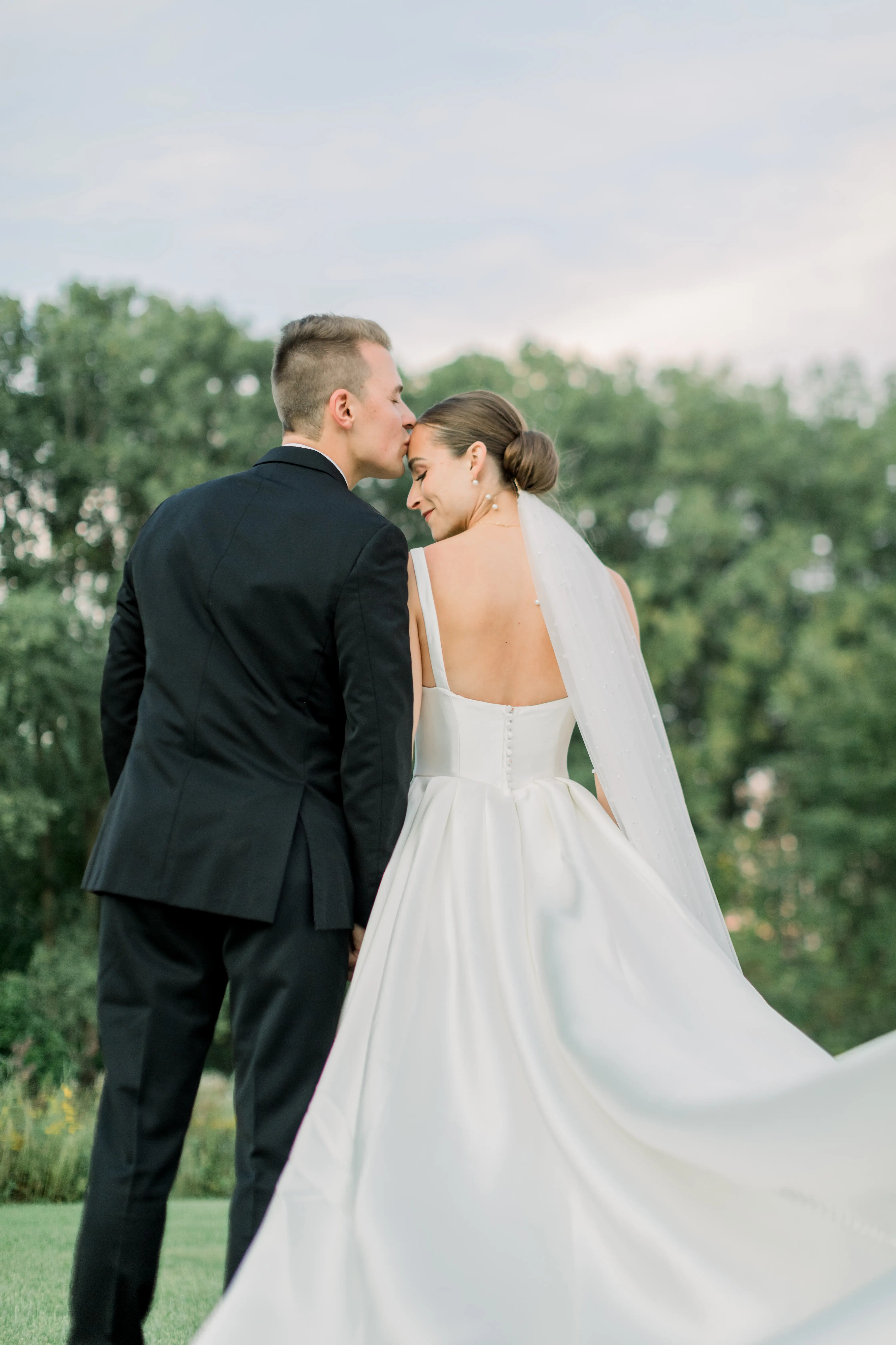 Bride Wearing Classic A-Line Wedding Dress Called Selena By Maggie Sottero With Groom