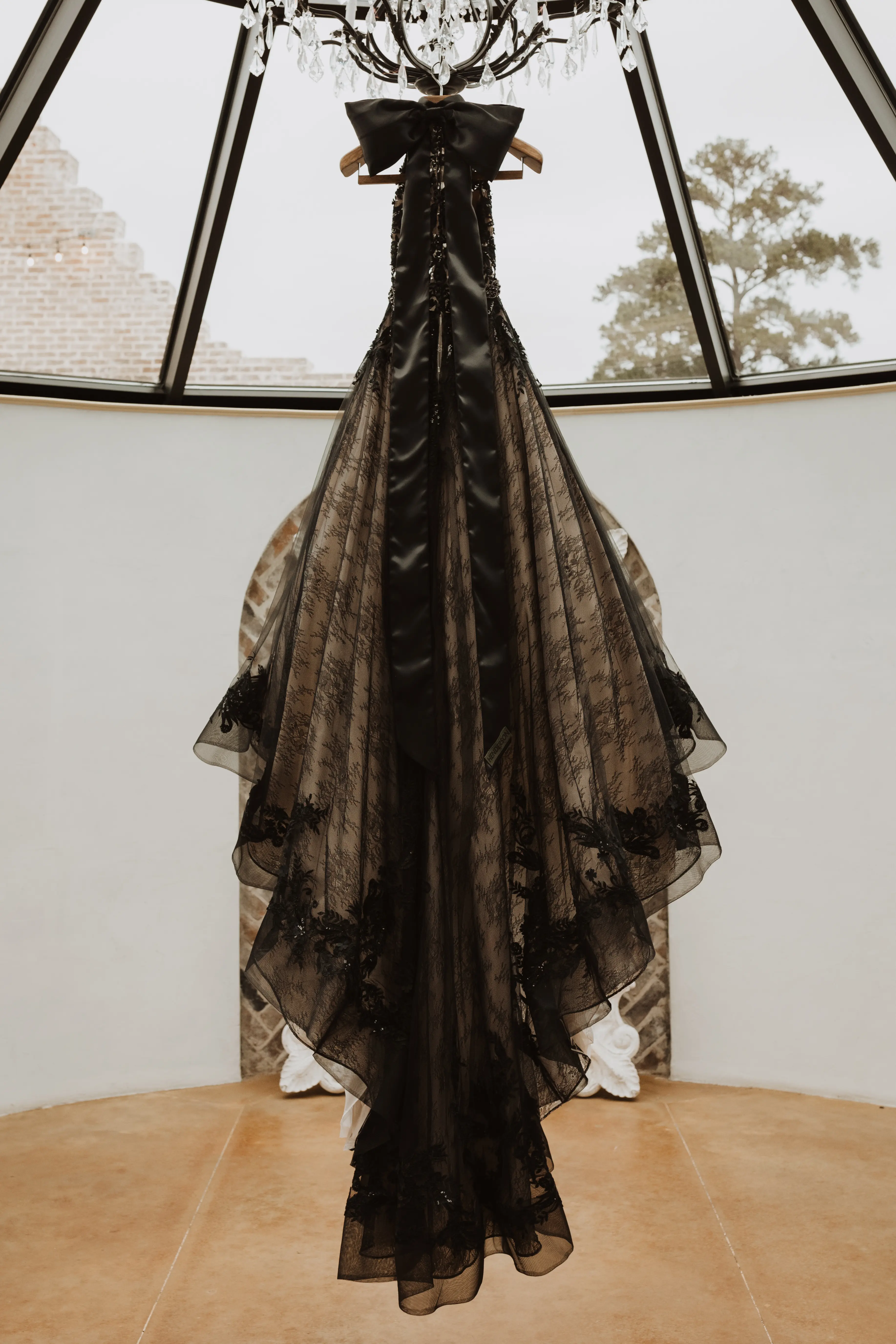 Real Bride's Beautiful Black Ball Gown Wedding Dress with Contrasting Layers of Tulle, Lace Motifs, and Chantilly Lace Called Zander by Sottero & Midgley