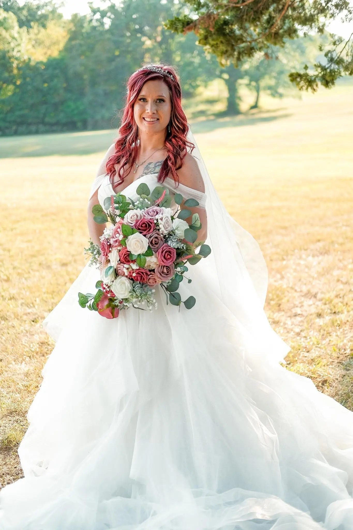 Bride Wearing Sparkly Princess Ballgown Wedding Dress Called Yasmin By Maggie Sottero Holding A Pink Purple And White Bouquet
