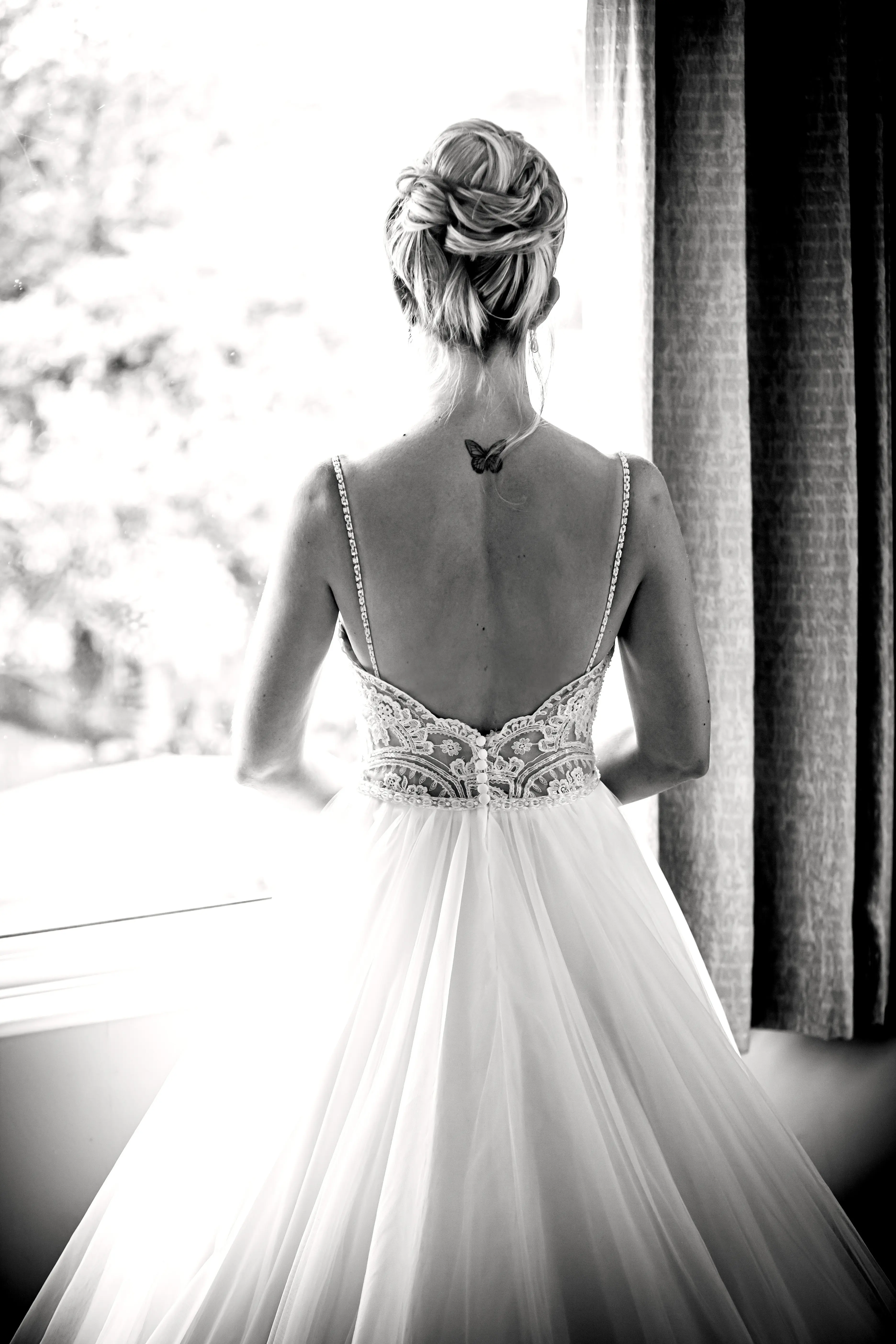 Back of bride wearing wedding dress called Mallory.