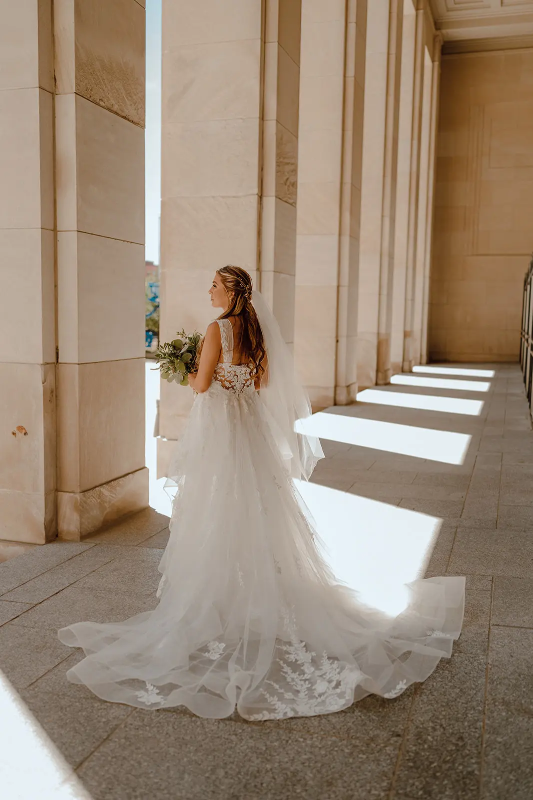Bride Wearing Floral Ethereal Tulle Wedding Dress Called Lettie By Rebecca Ingram Back With Shoulder Straps