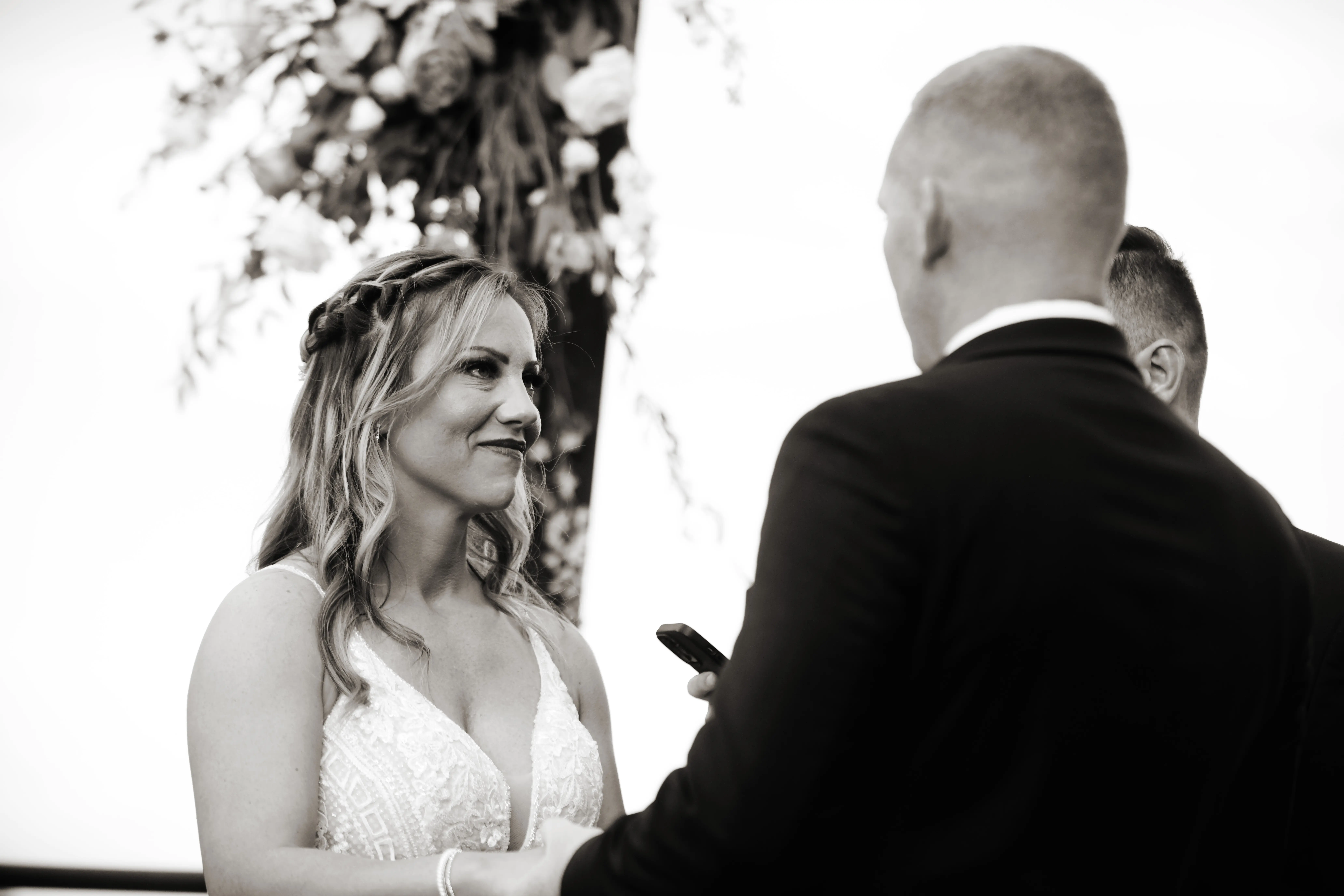 Groom with Bride in V-Neckline Wedding Gown Accented with Beaded Detail Called Bailey by Sottero & Midgley