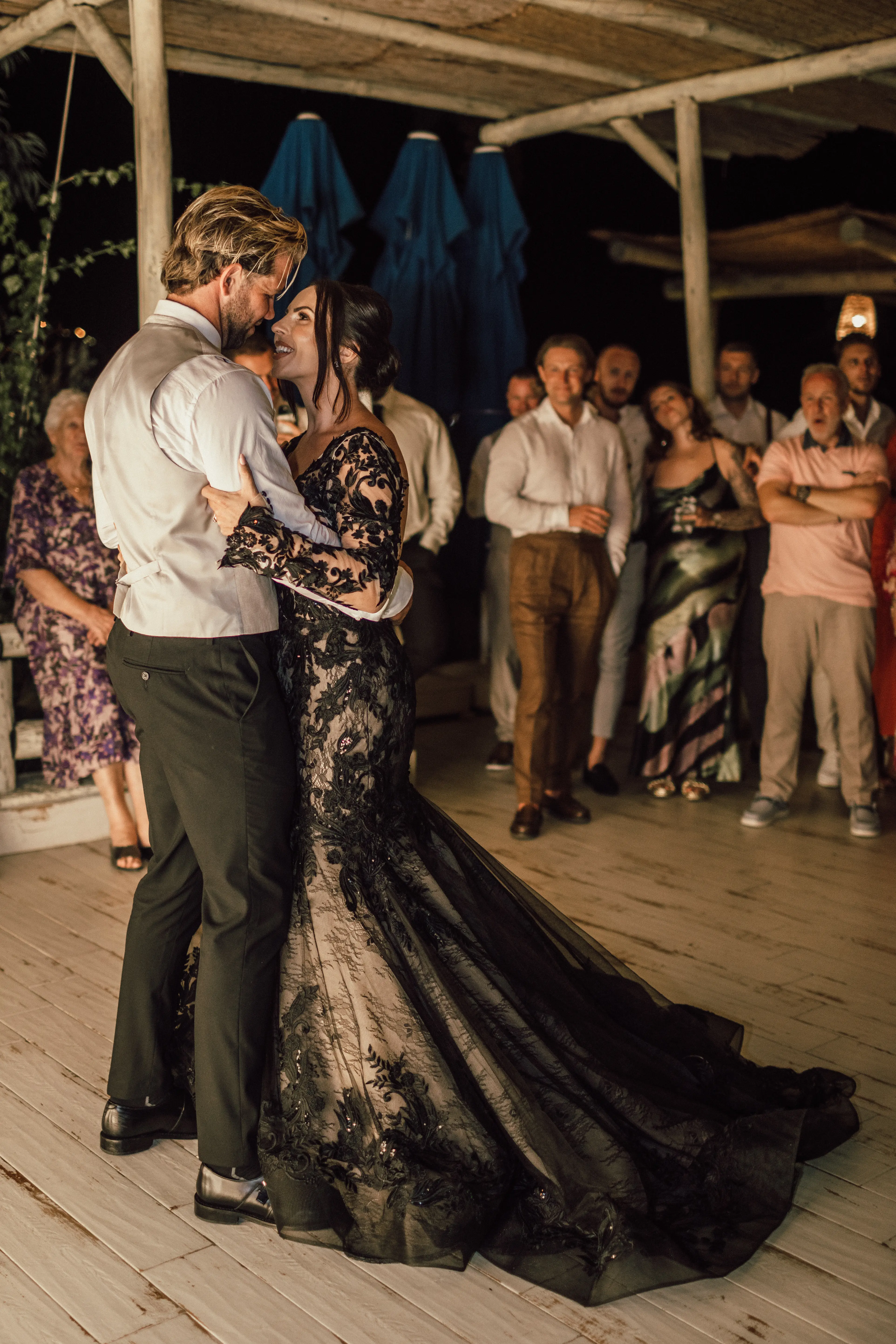 Bride Wearing Black Fit And Flare Wedding Dress Called Zander Lane By Sottero And Midgley Dancing With Groom At The Reception