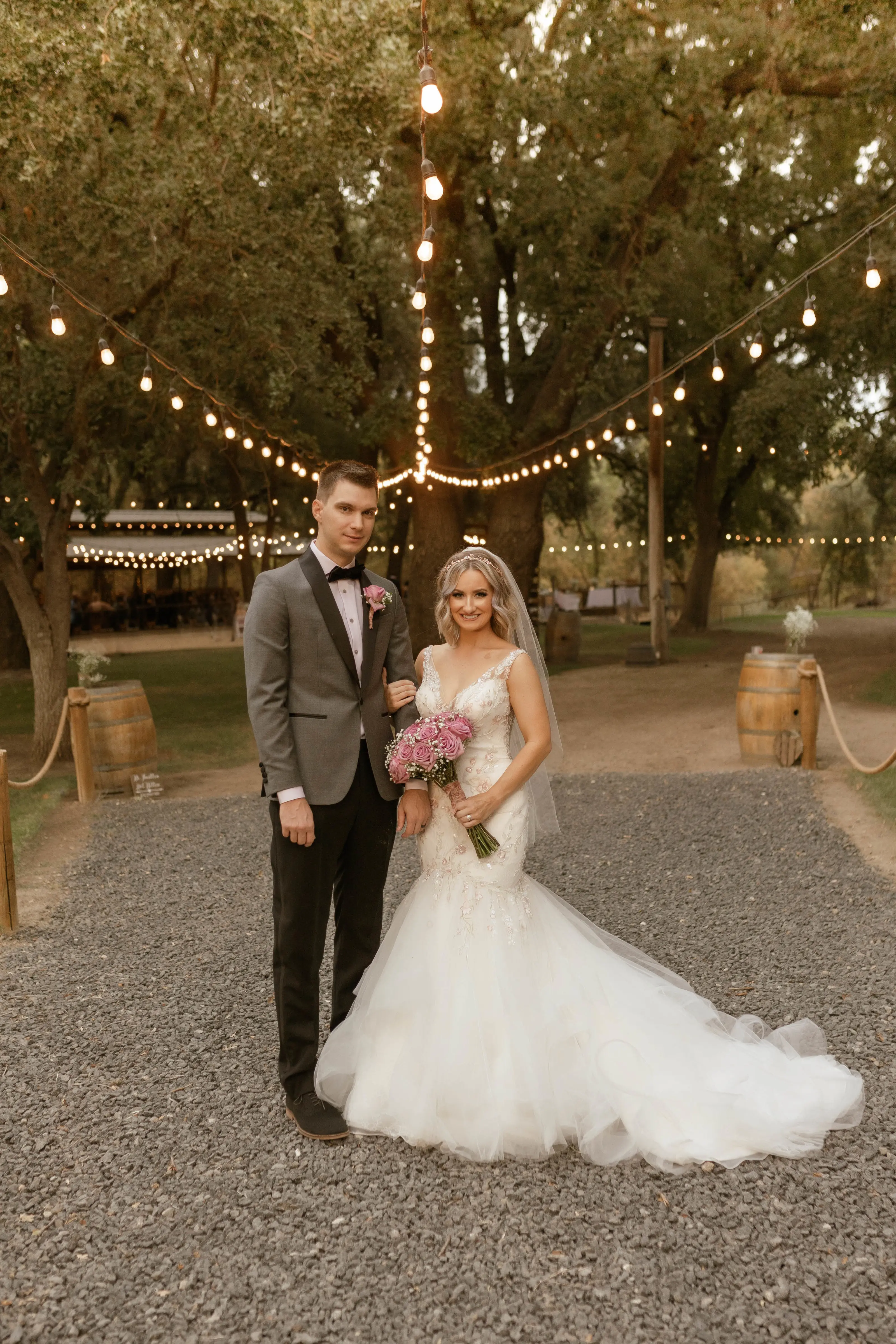Bride Wearing Pink Lace Mermaid Wedding Dress Called Kenleigh By Sottero And Midgley With Groom
