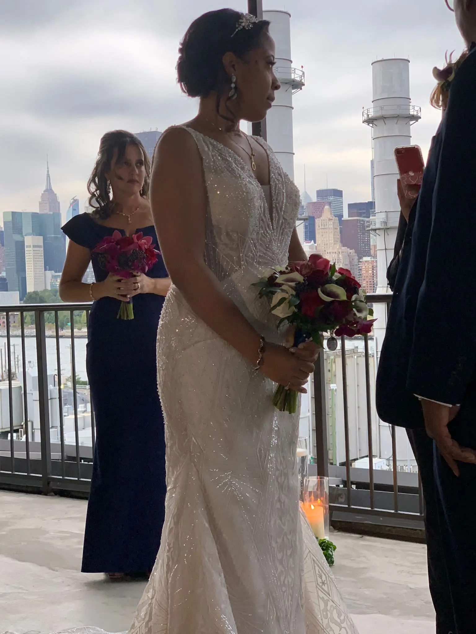 Bride Standing At The Altar Wearing Beaded Embroidered Wedding Dress Called Elaine By Maggie Sottero