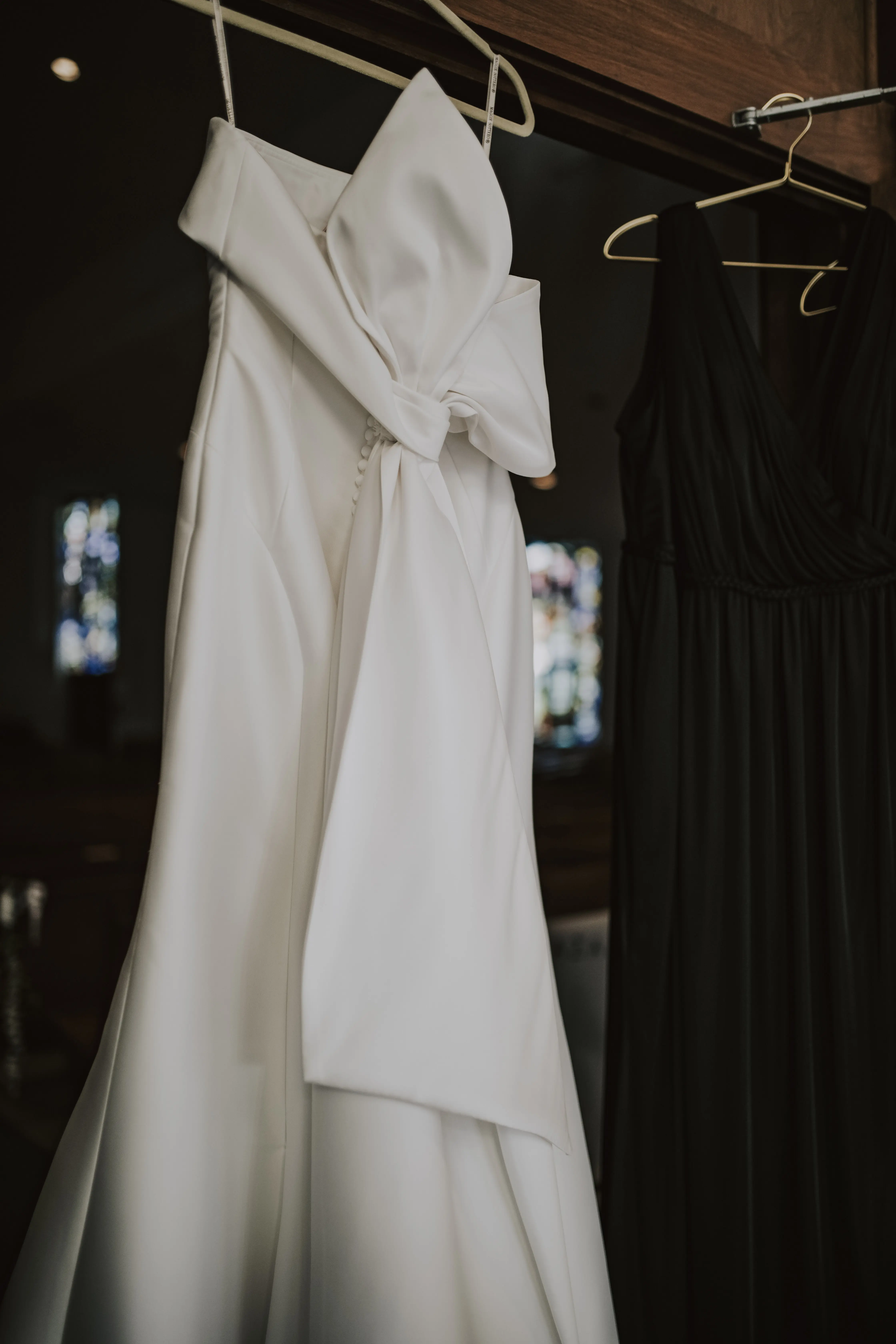 Mitchell wedding dress by Maggie Sottero hanging up