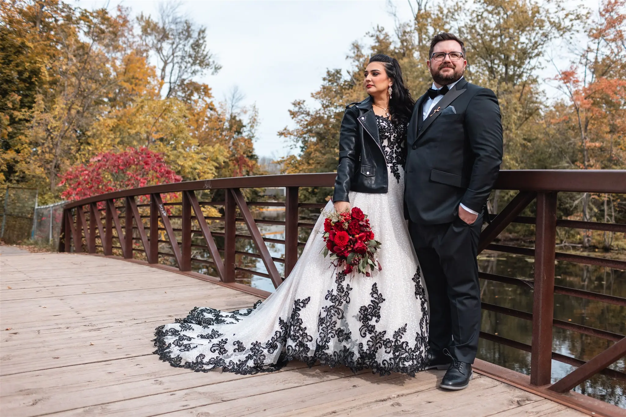Bride In Strapless Black Wedding Dress Called Tristyn By Maggie Sottero With Groom