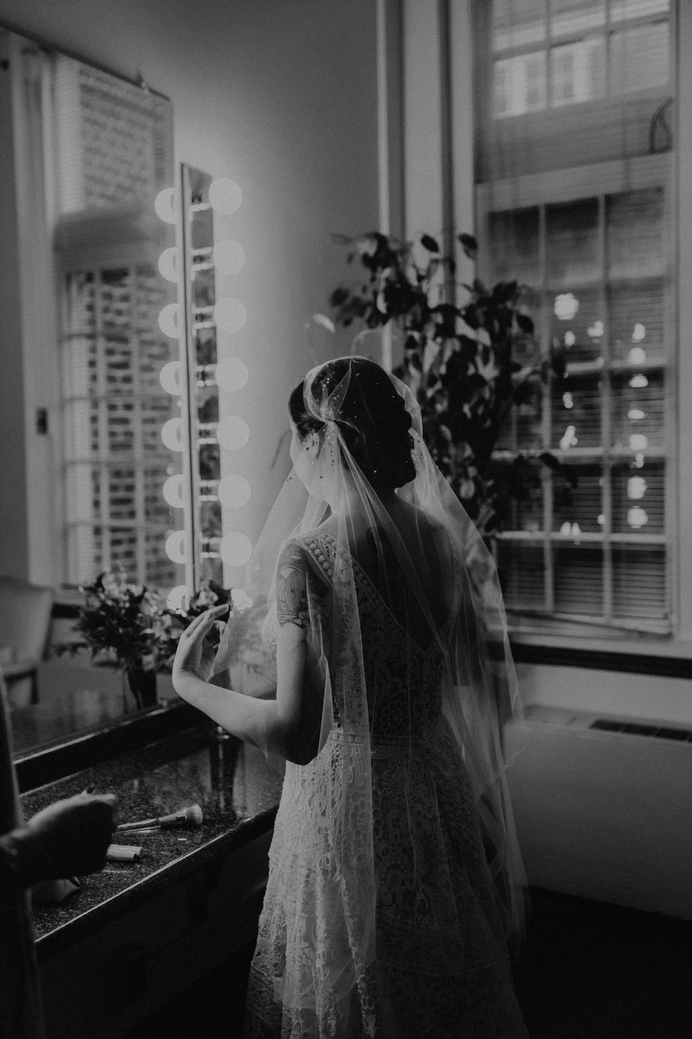 Bride Getting Ready Wearing Boho Lace Aline Wedding Gown Called Finley Dawn by Sottero and Midgley