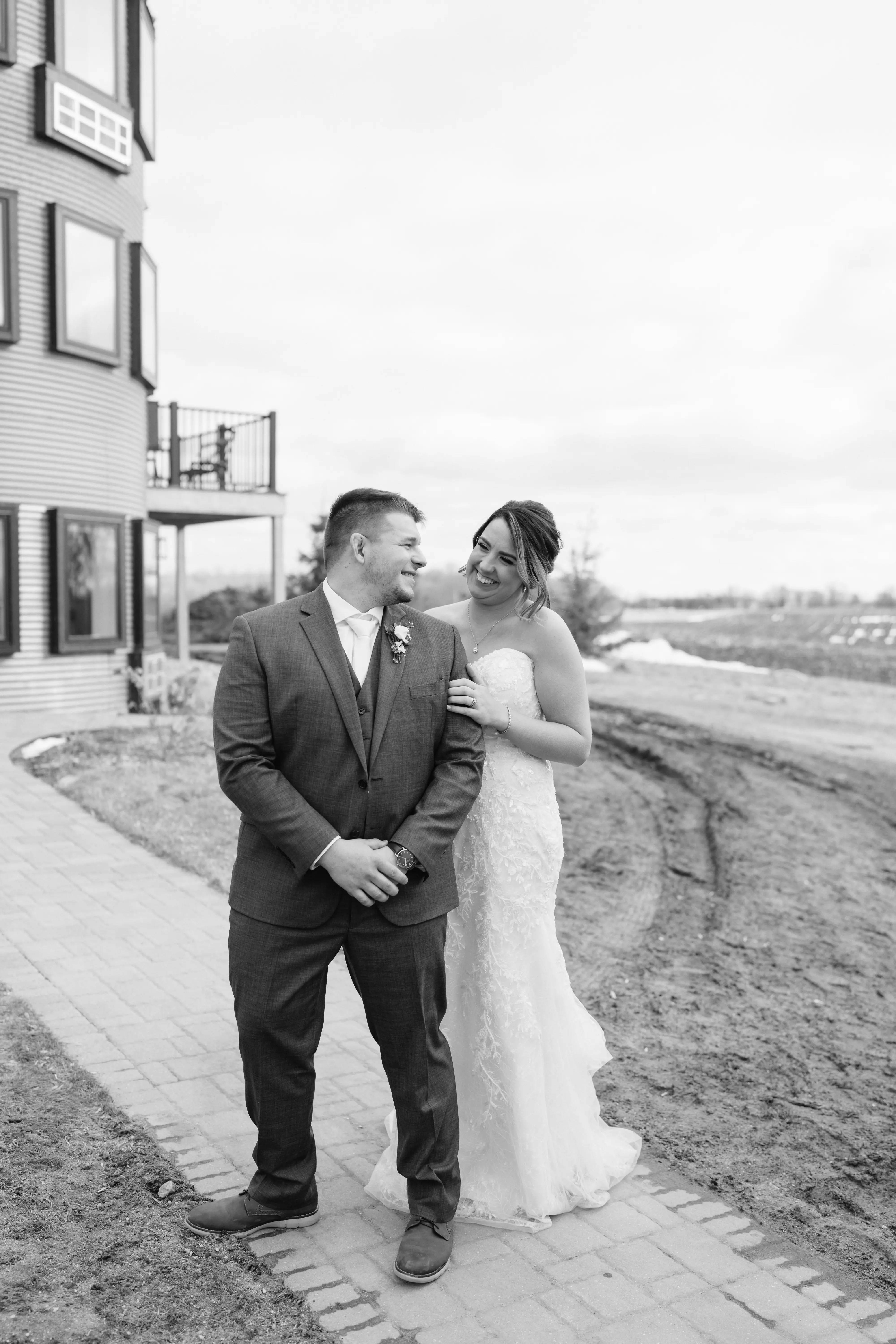 Bride Wearing Lace Beaded Wedding Dress Called Charmaine By Maggie Sottero With Groom