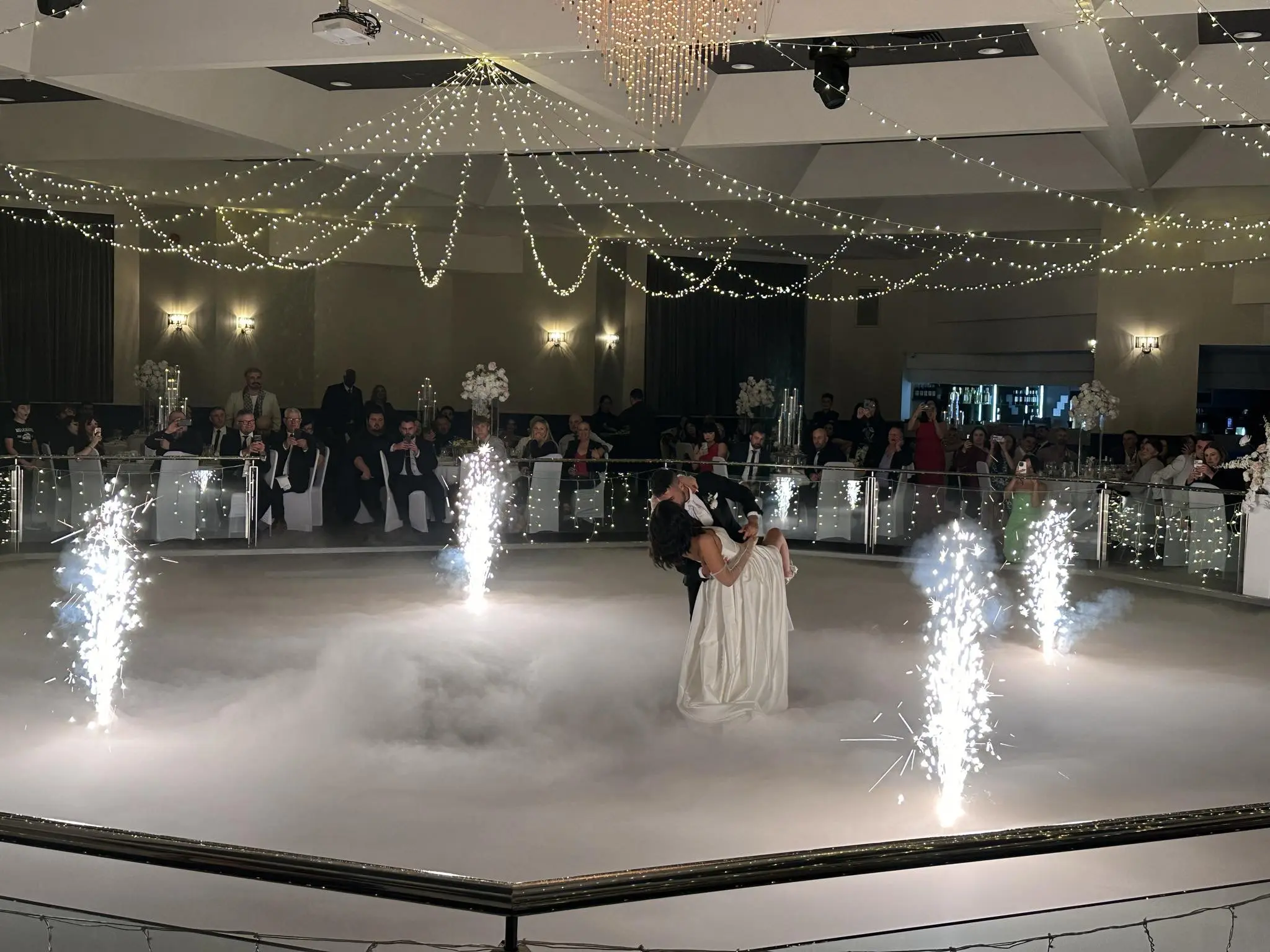 Bride wearing Aspen by Sottero and Midgley dancing with her husband