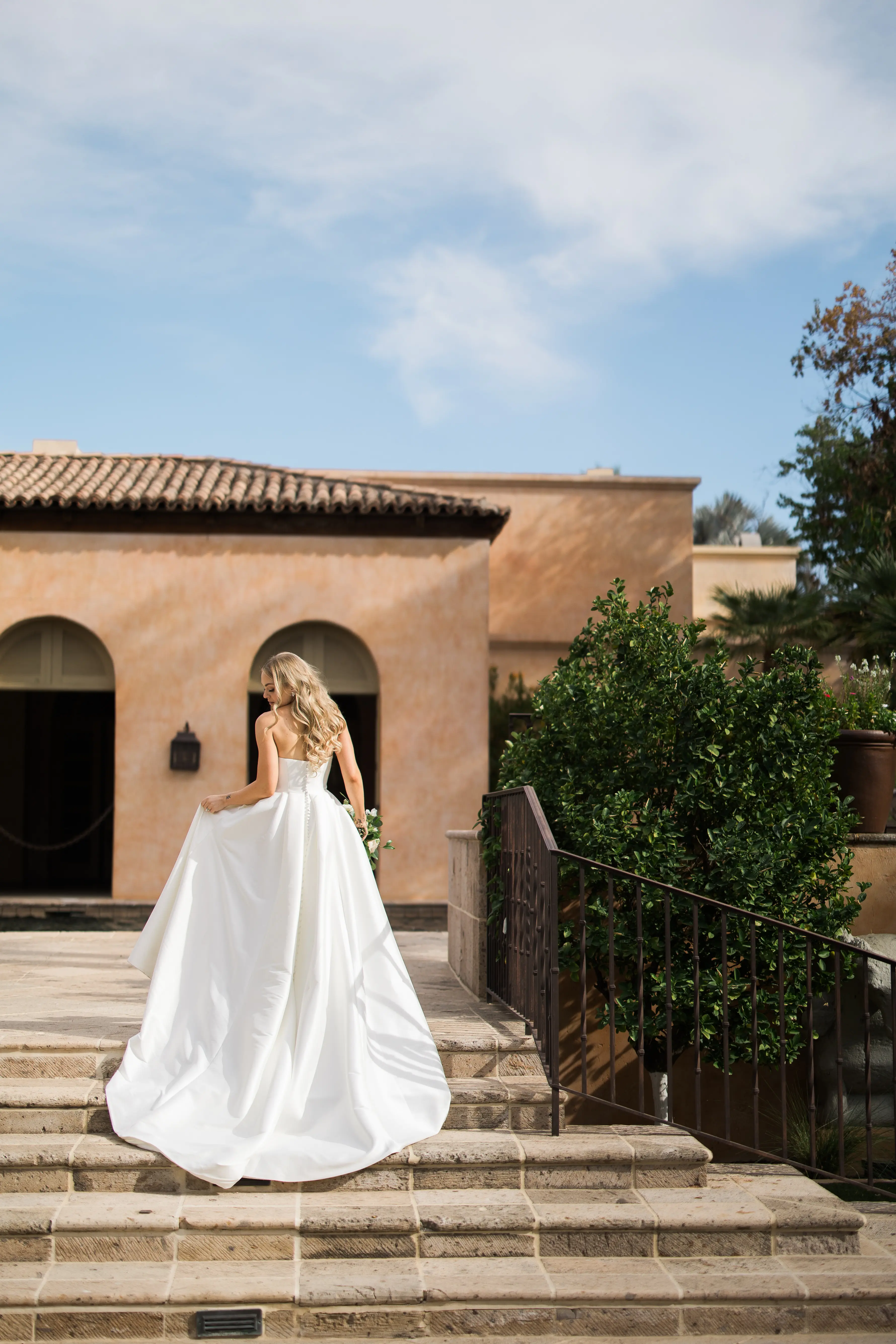 Bride wearing Aspen wedding dress by Sottero and Midgley