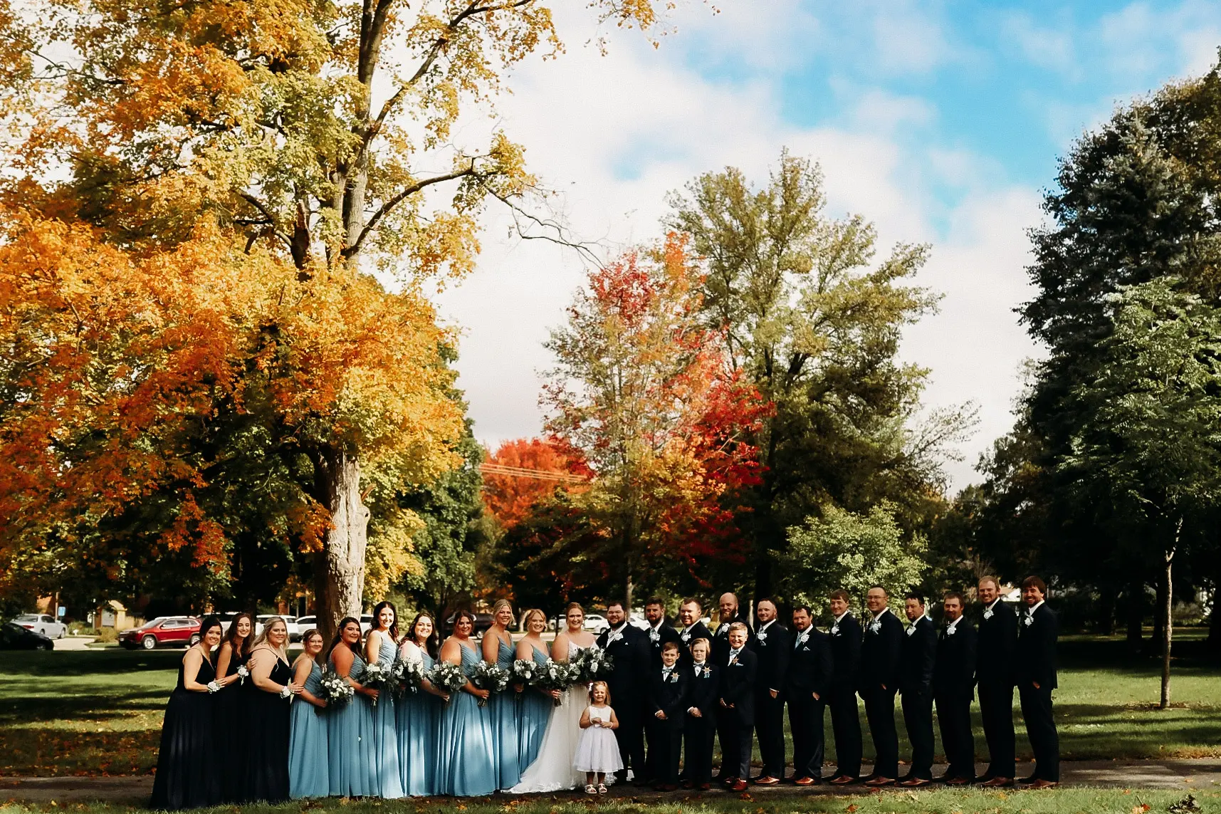 Bride wearing Pia wedding dress by Maggie Sottero with wedding party