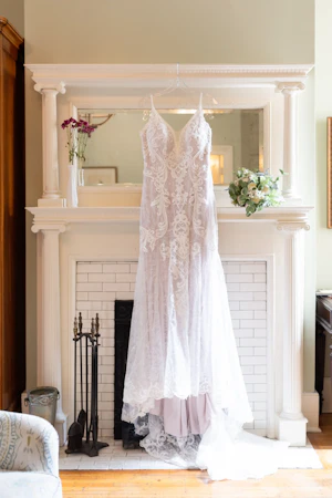 Unique lacy sheath wedding dress called Esther.