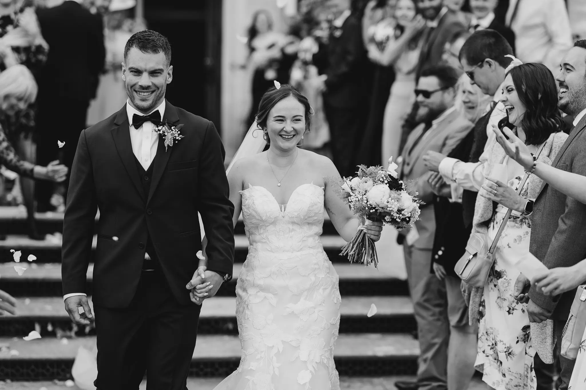 Groom With Bride Wearing Strapless Mermaid Wedding Dress With Oversized Lace Hattie By Rebecca Ingram