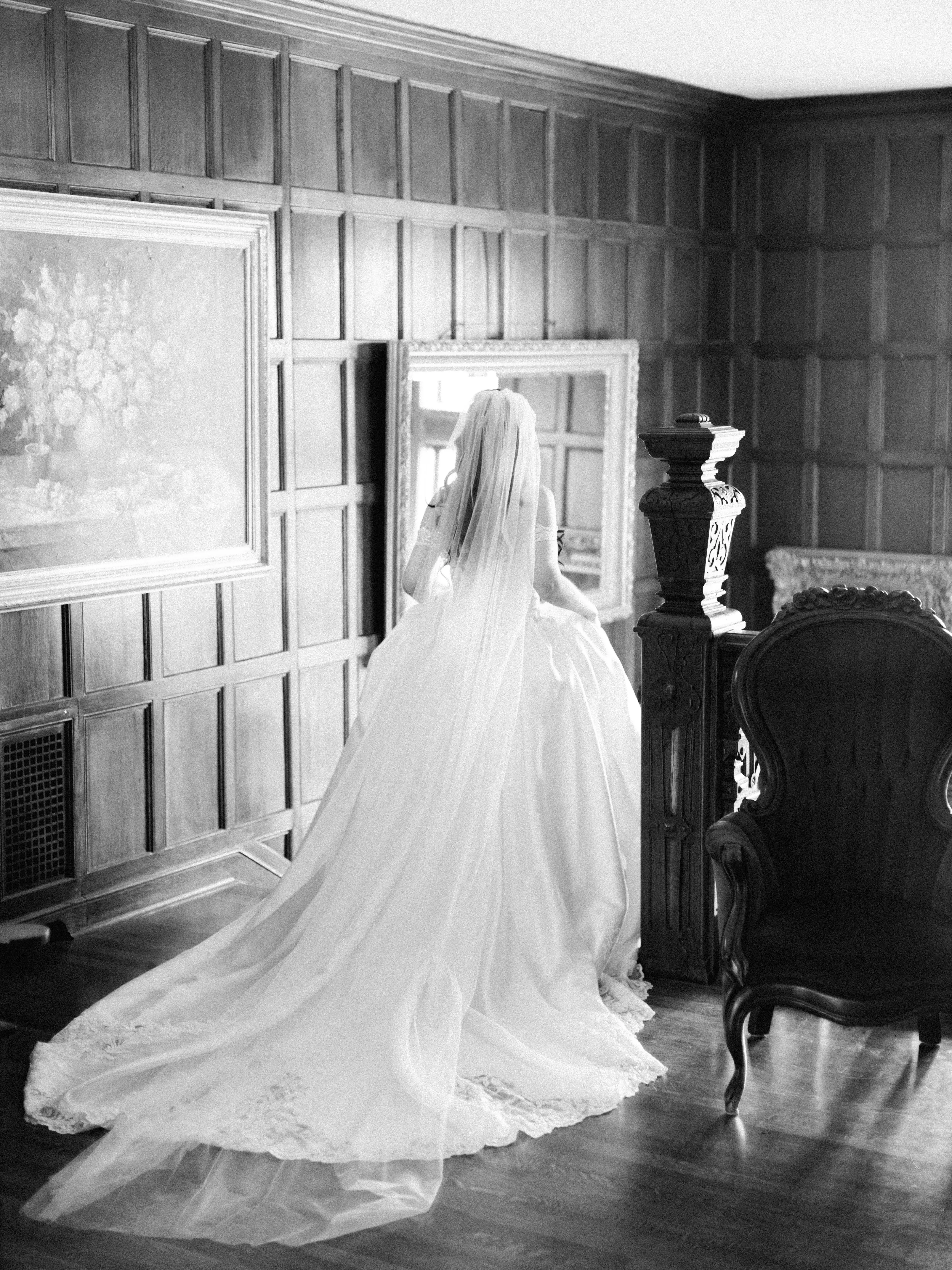 Bride wearing off the shoulder luxury ballgown wedding dress