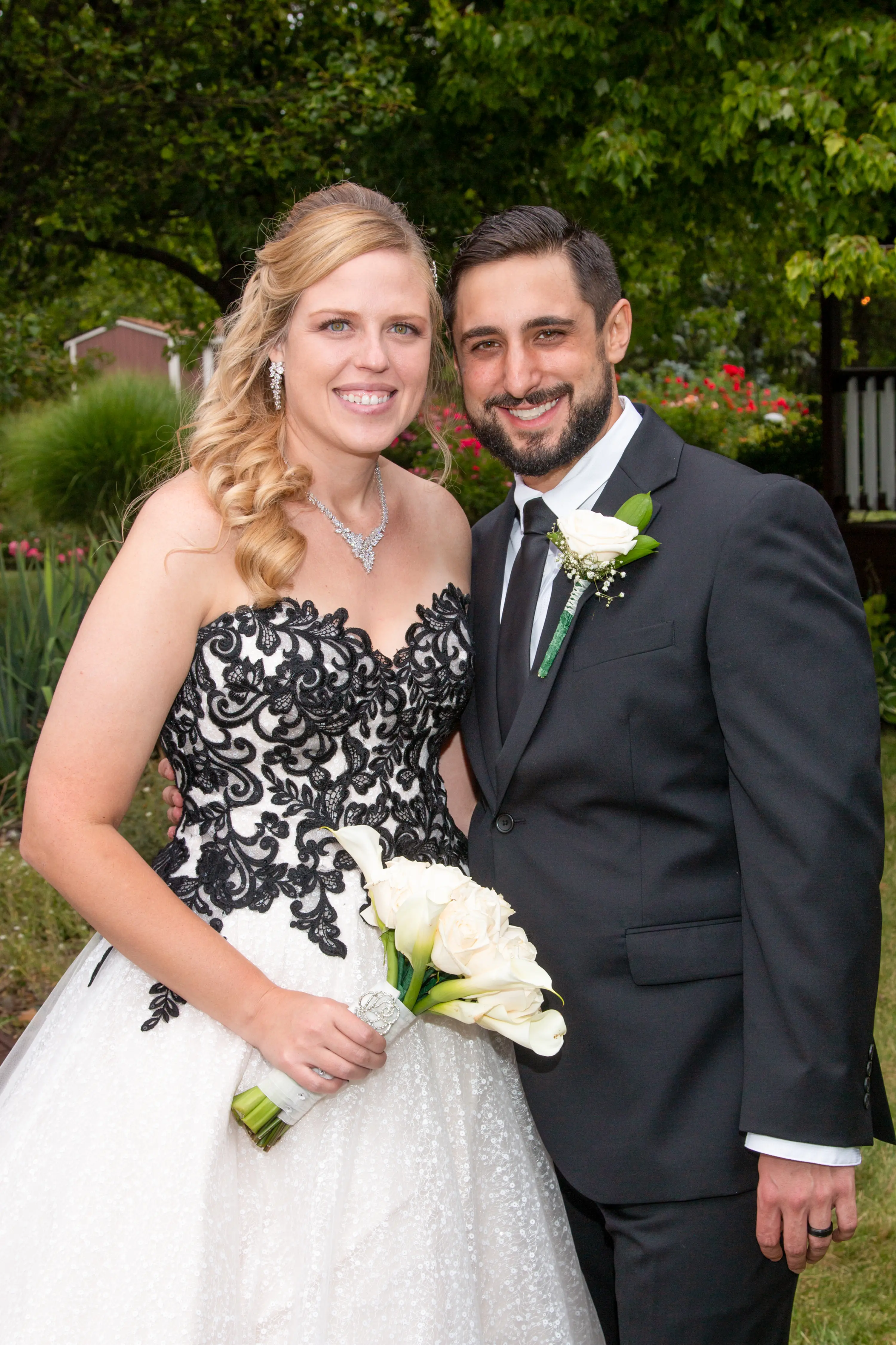 Bride Wearing A-Line Black Lace Wedding Dress Called Tristyn By Maggie Sottero With Groom