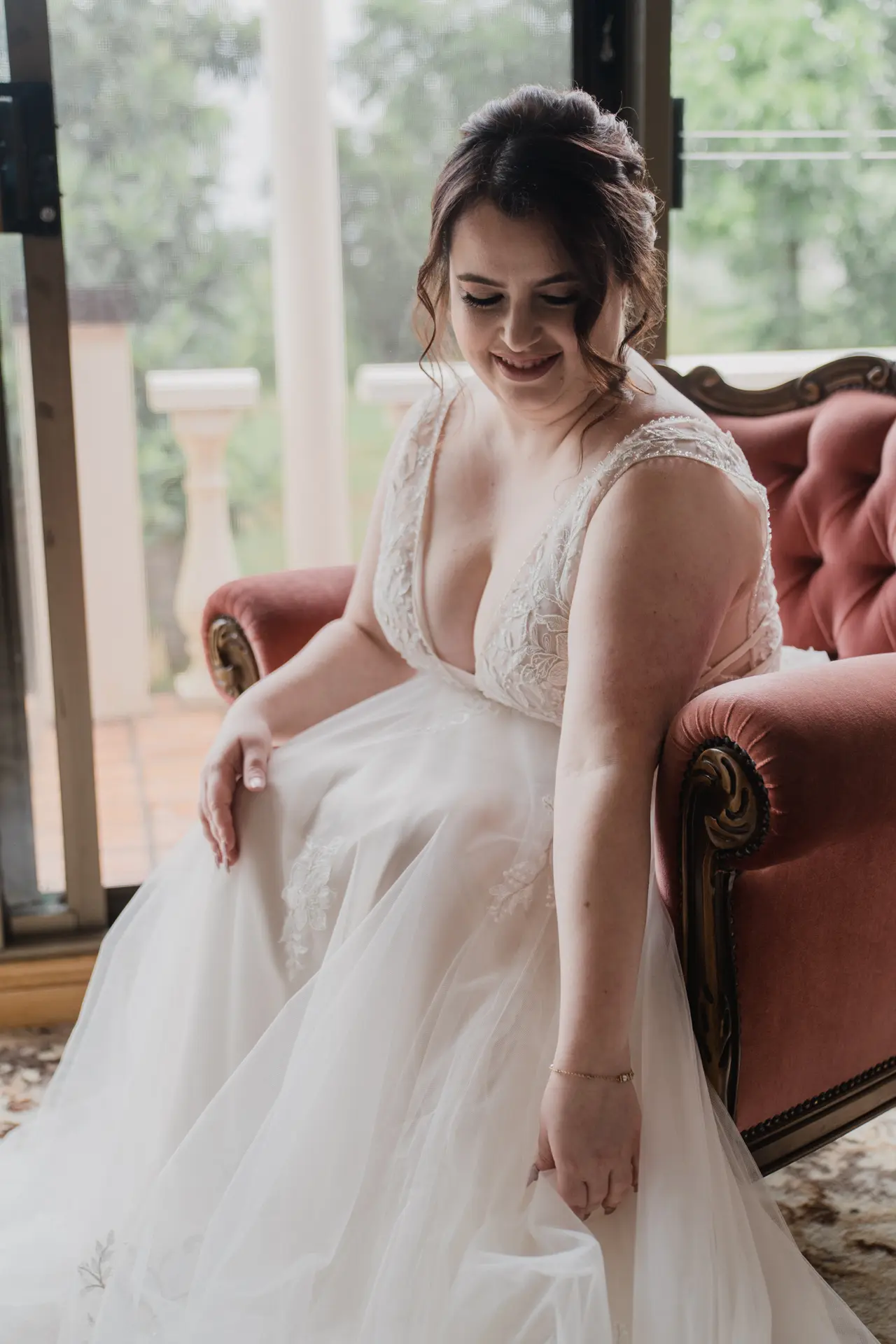 Bride in Plunging Illusion V-Neckline Wedding Dress Raelynn by Rebecca Ingram