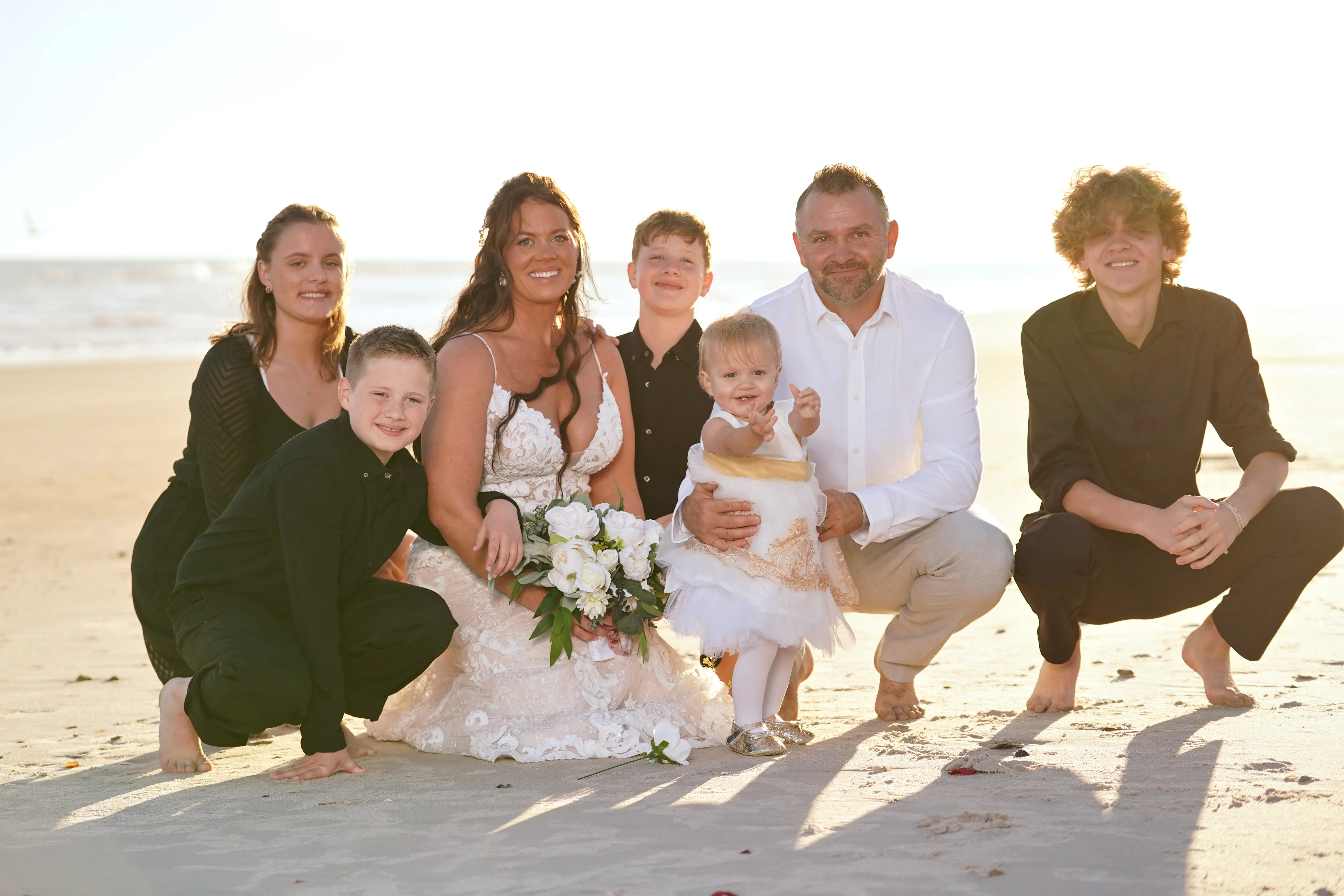 Groom With Bride Wearing Lace Sheath Wedding Gown Tuscany Lynette By Maggie Sottero