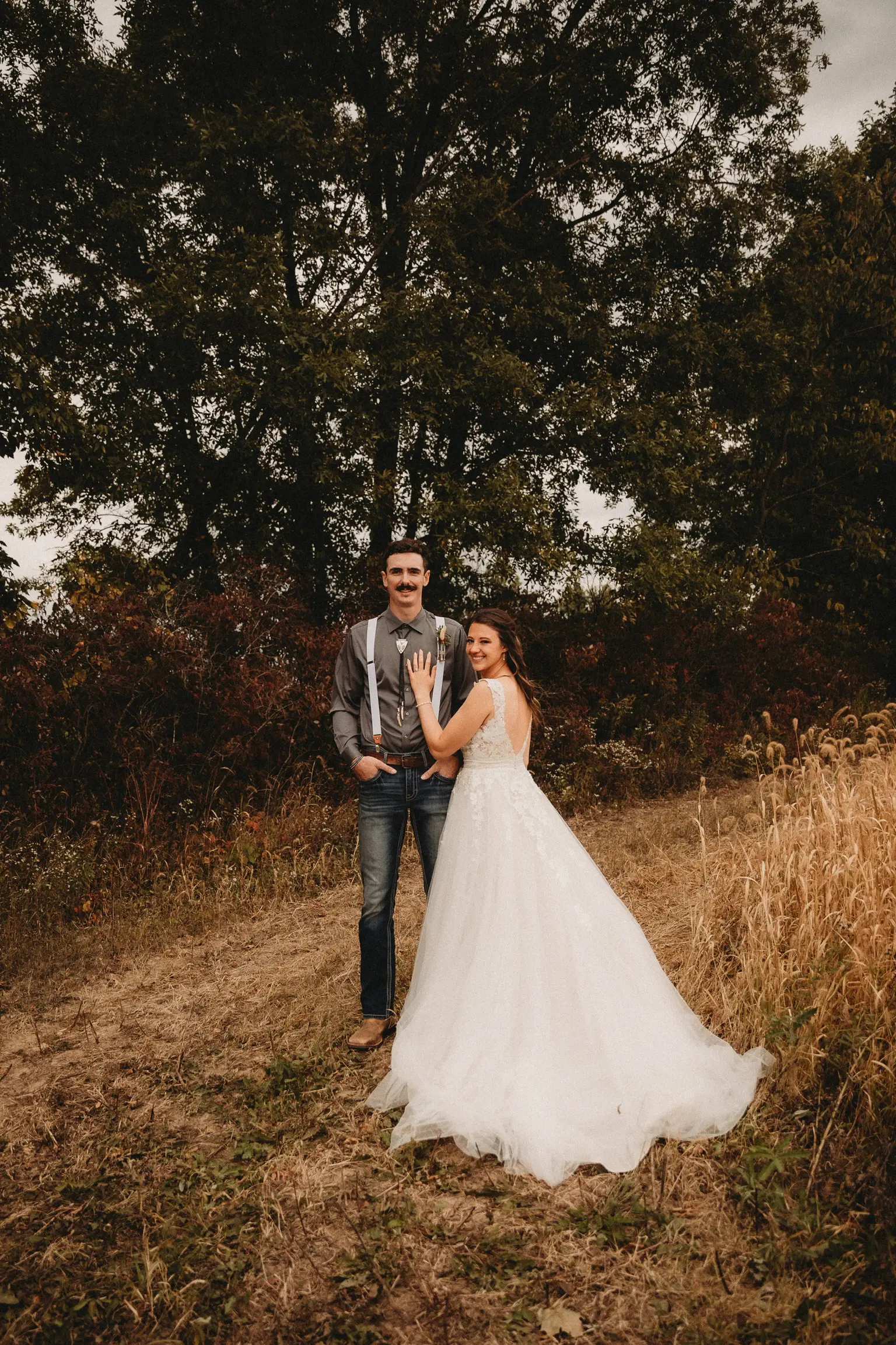 Real Bride in A-Line Wedding Dress with Flowy Tulle Skirt and Sheer Lace Bodice Called Ohara by Maggie Sottero