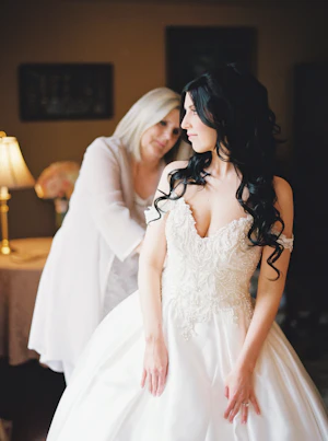 Bride wearing off the shoulder luxury ballgown wedding dress