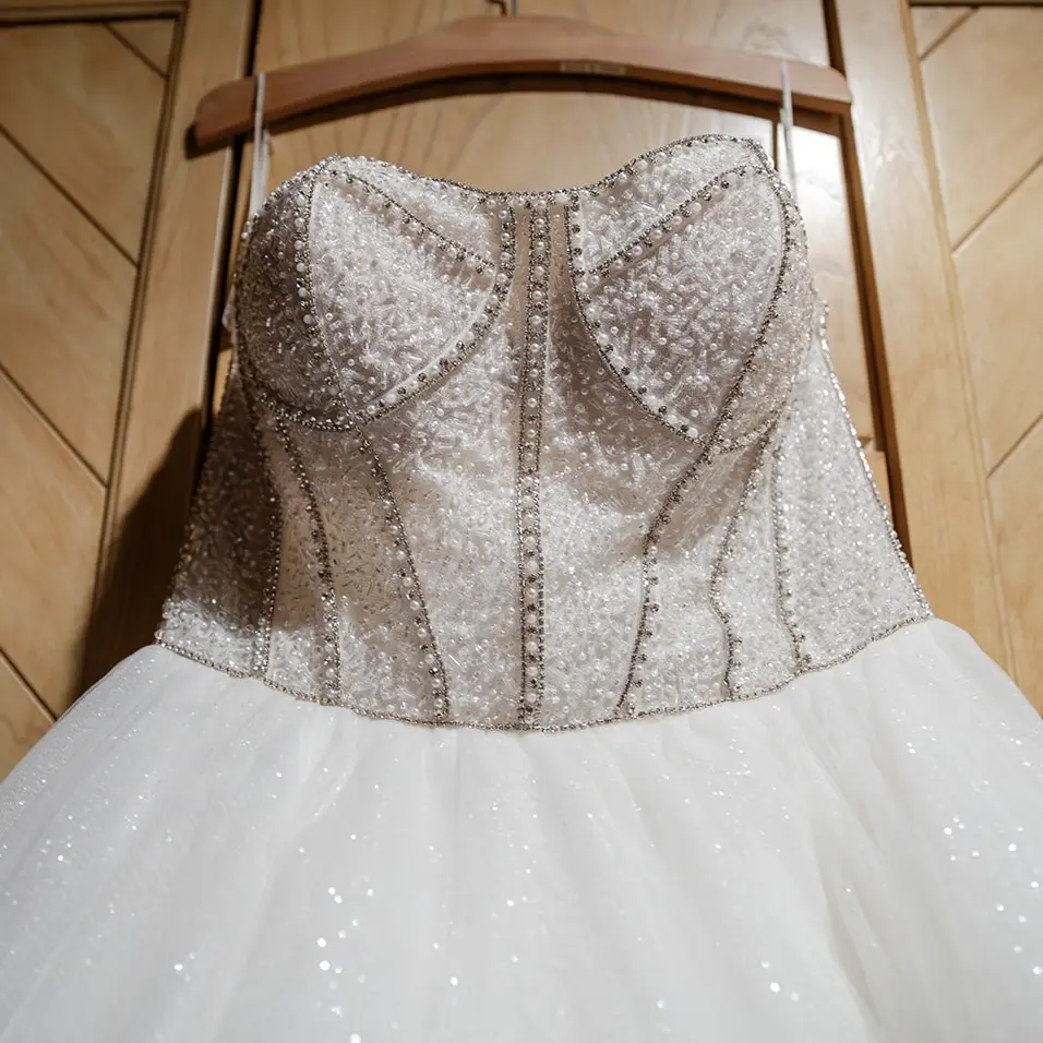 Elton wedding dress by Sottero and Midgley hanging up
