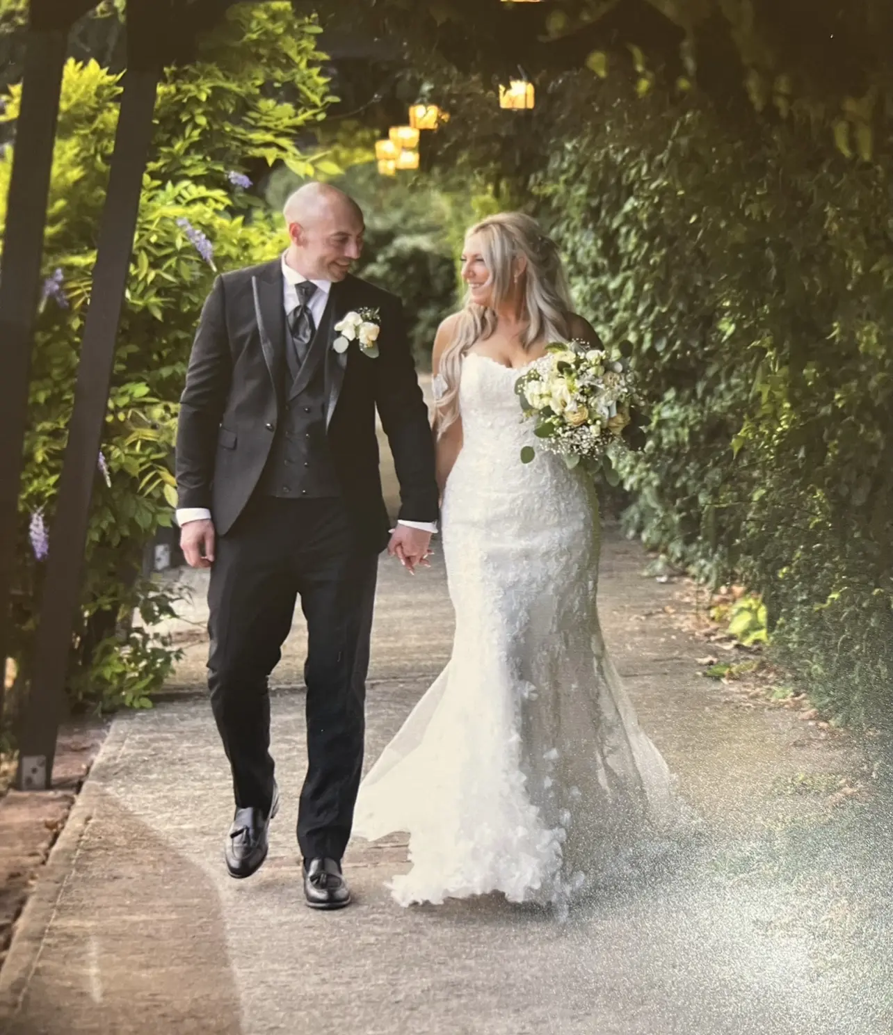 Bride Wearing 3D Floral Lace Wedding Dress Called Ryker By Sottero And Midgley
