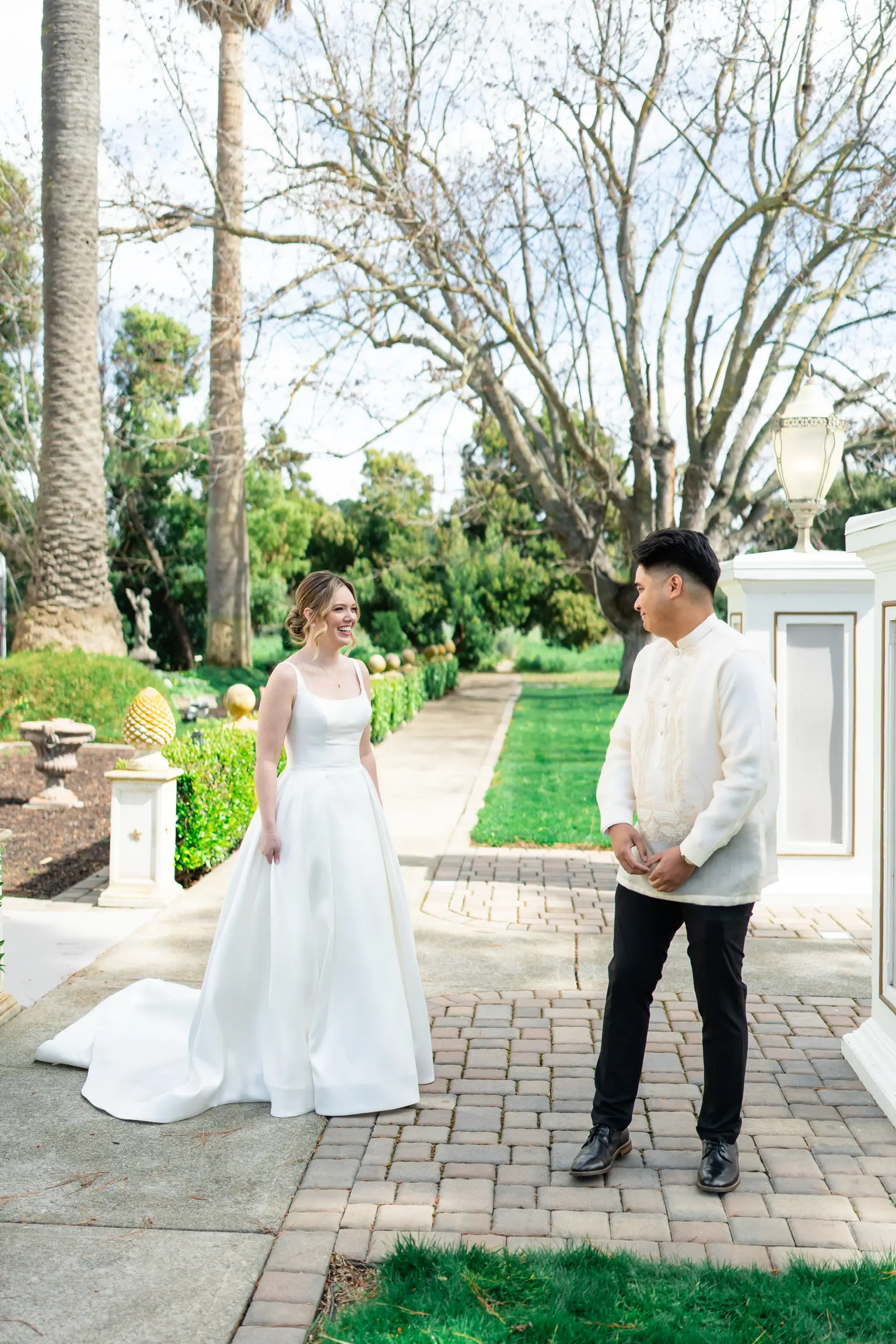 Bride wearing Selena by Maggie Sottero doing a first look with her husband