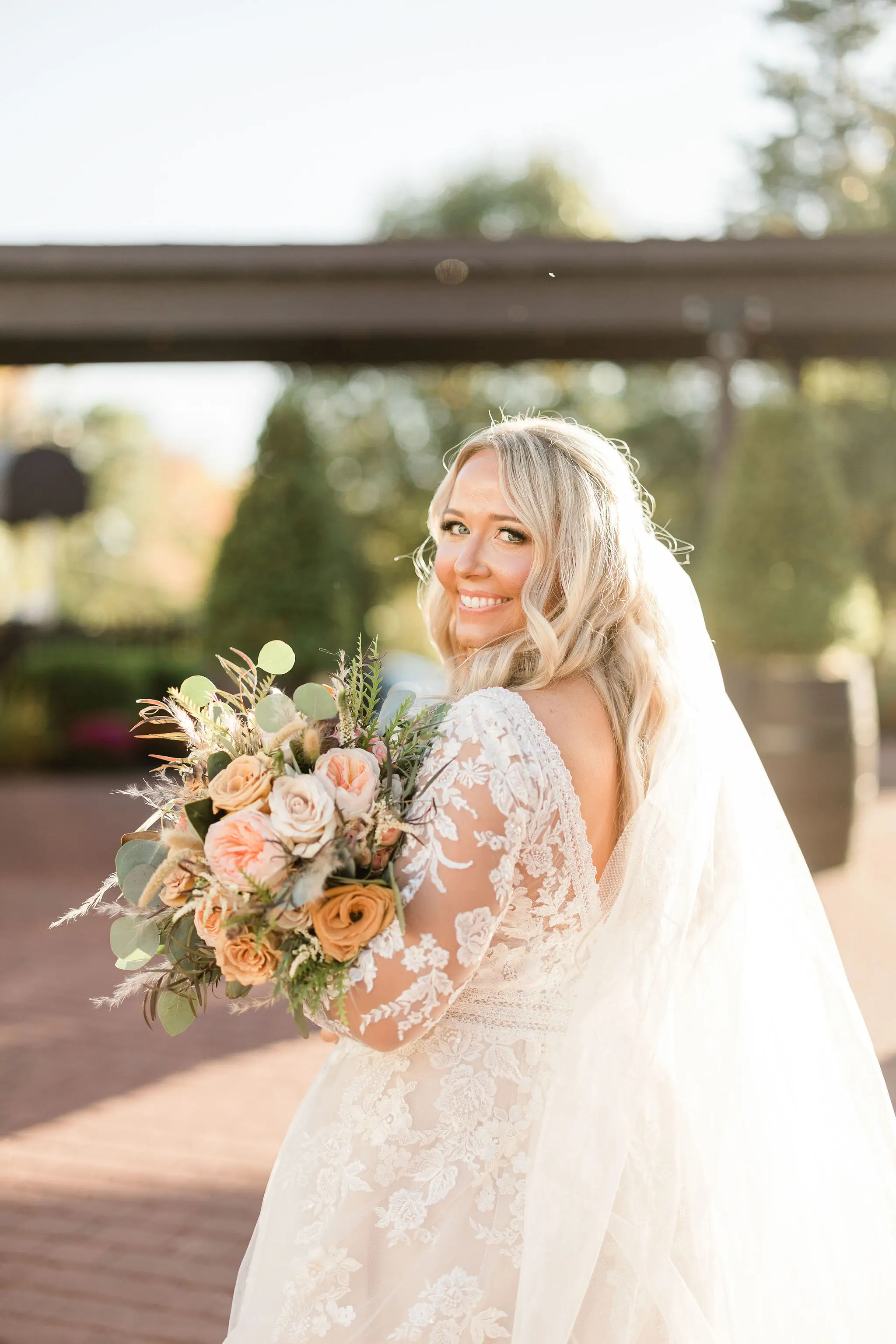 Real Bride in Illusion Sleeve A-Line Wedding Dress with Beaded Lace Motifs Over Sparkle Tulle Called Raphael by Maggie Sottero